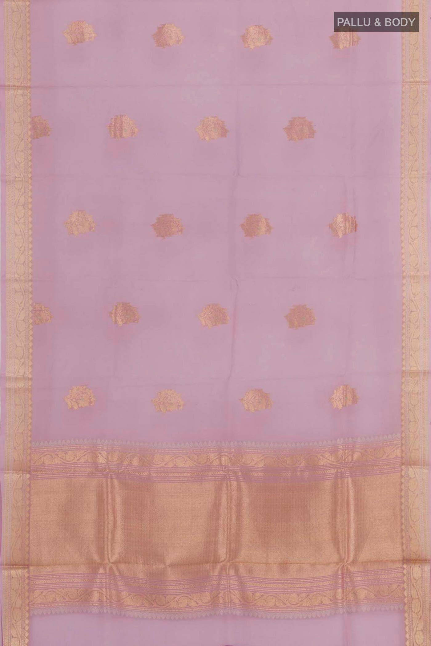 Flat view of Lavender Banarasi Kora Silk Saree with Zari Butta on the body and Zari Border. 