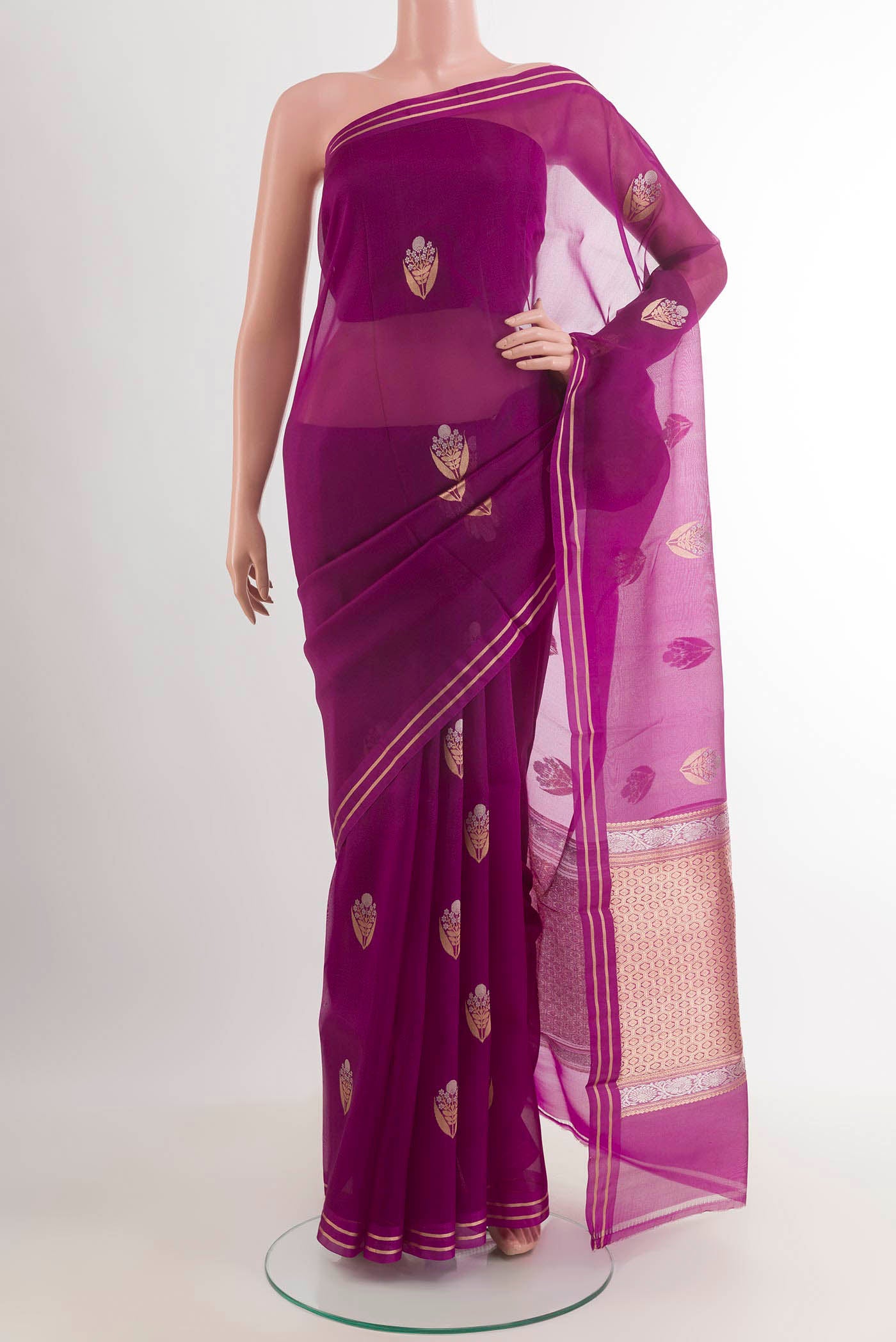 Purple Banarasi Kora Silk Saree with Zari Butta on the body and Zari Border.  displayed on a mannequin