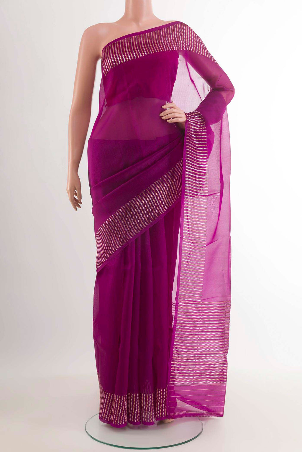 Purple Banarasi Kora Silk Saree with Zari Butta on the body and Zari Border.  displayed on a mannequin