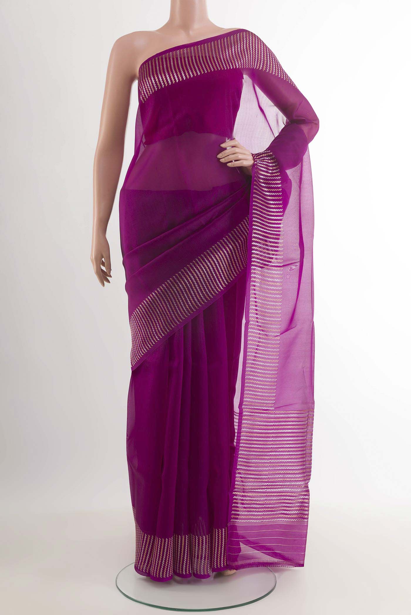 Purple Banarasi Kora Silk Saree with Zari Butta on the body and Zari Border.  displayed on a mannequin