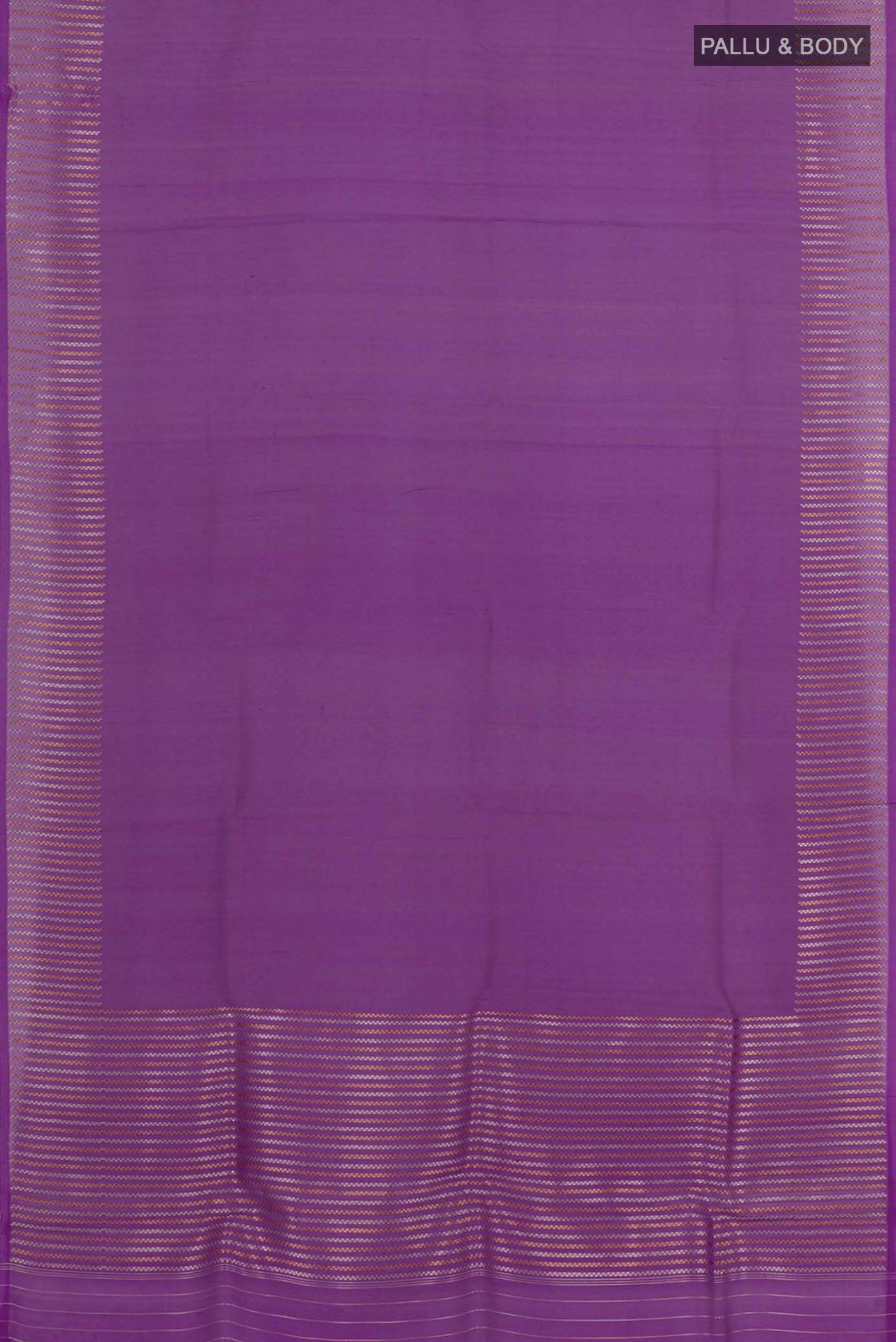Flat view of Purple Banarasi Kora Silk Saree with Zari Butta on the body and Zari Border. 