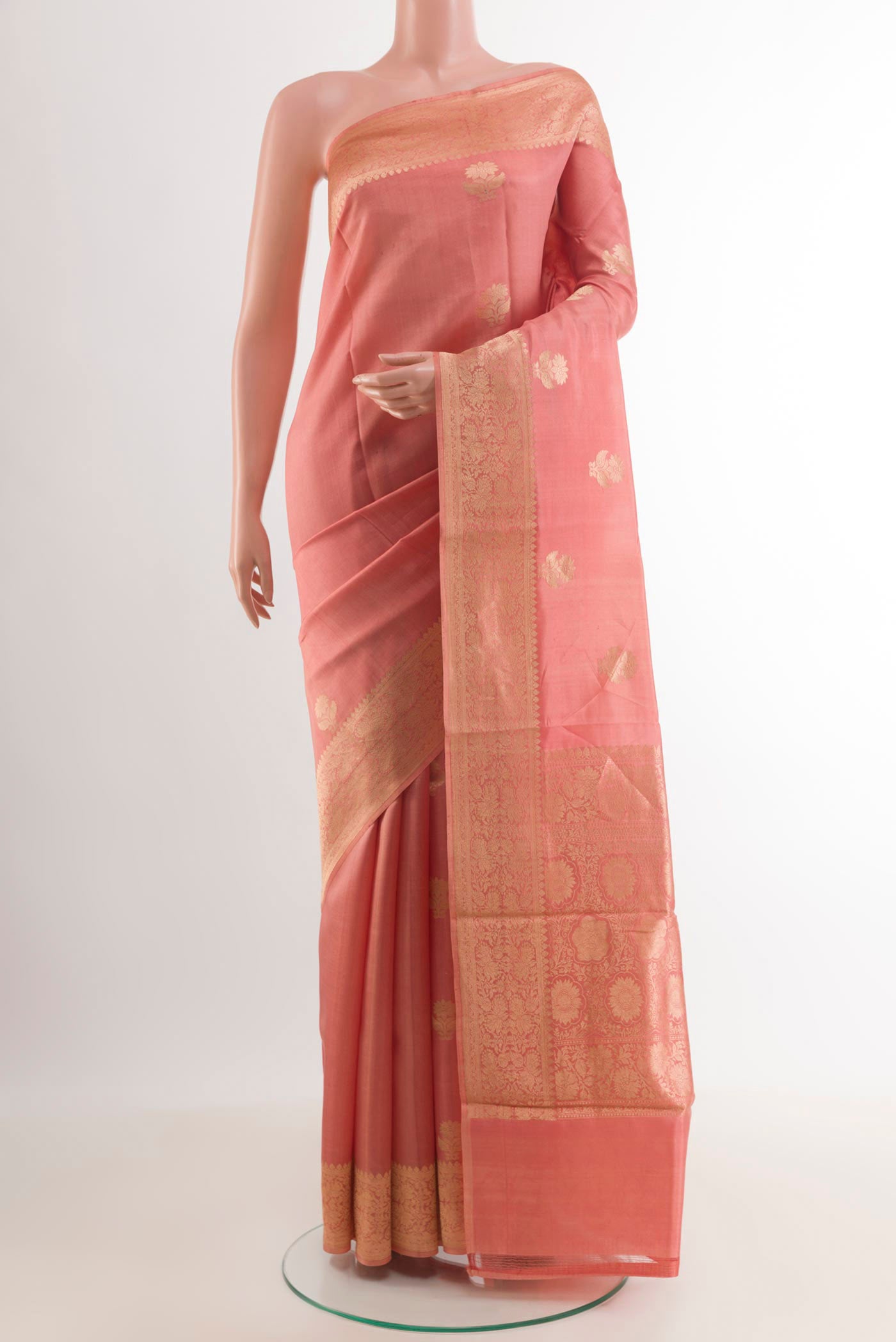 Rose pink Banarasi Katan Silk Saree with Zari Butta on the body and Zari Border.  displayed on a mannequin