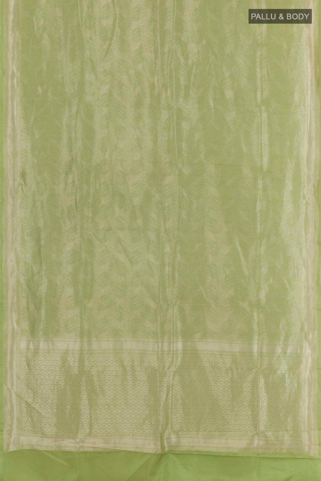 Flat view of Green Crepe Saree with Zari Brocade on the body and Zari Border. 