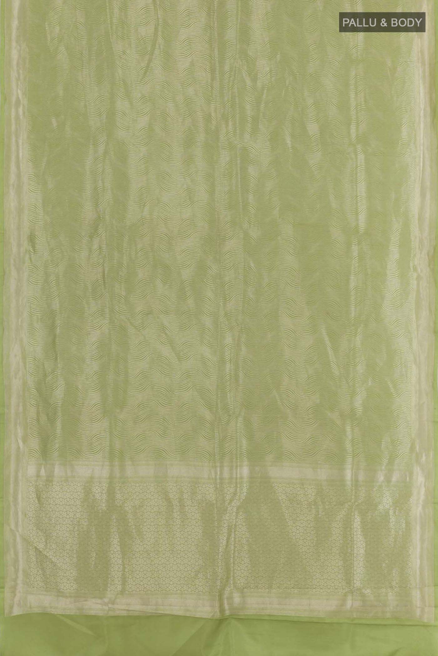 Flat view of Green Crepe Saree with Zari Brocade on the body and Zari Border. 