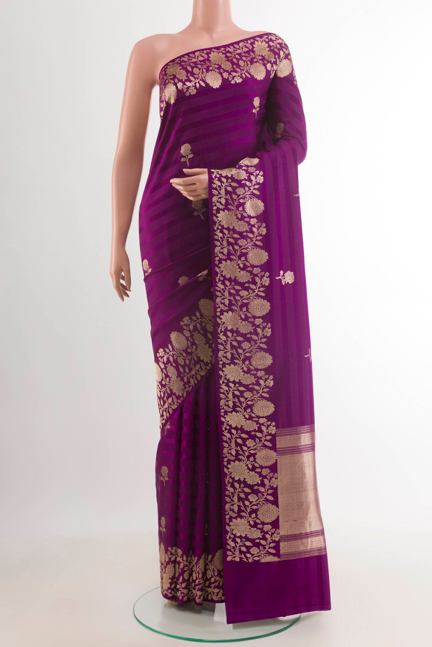 Purple Banarasi Silk Saree with Zari Butta on the body and Zari Border.  displayed on a mannequin