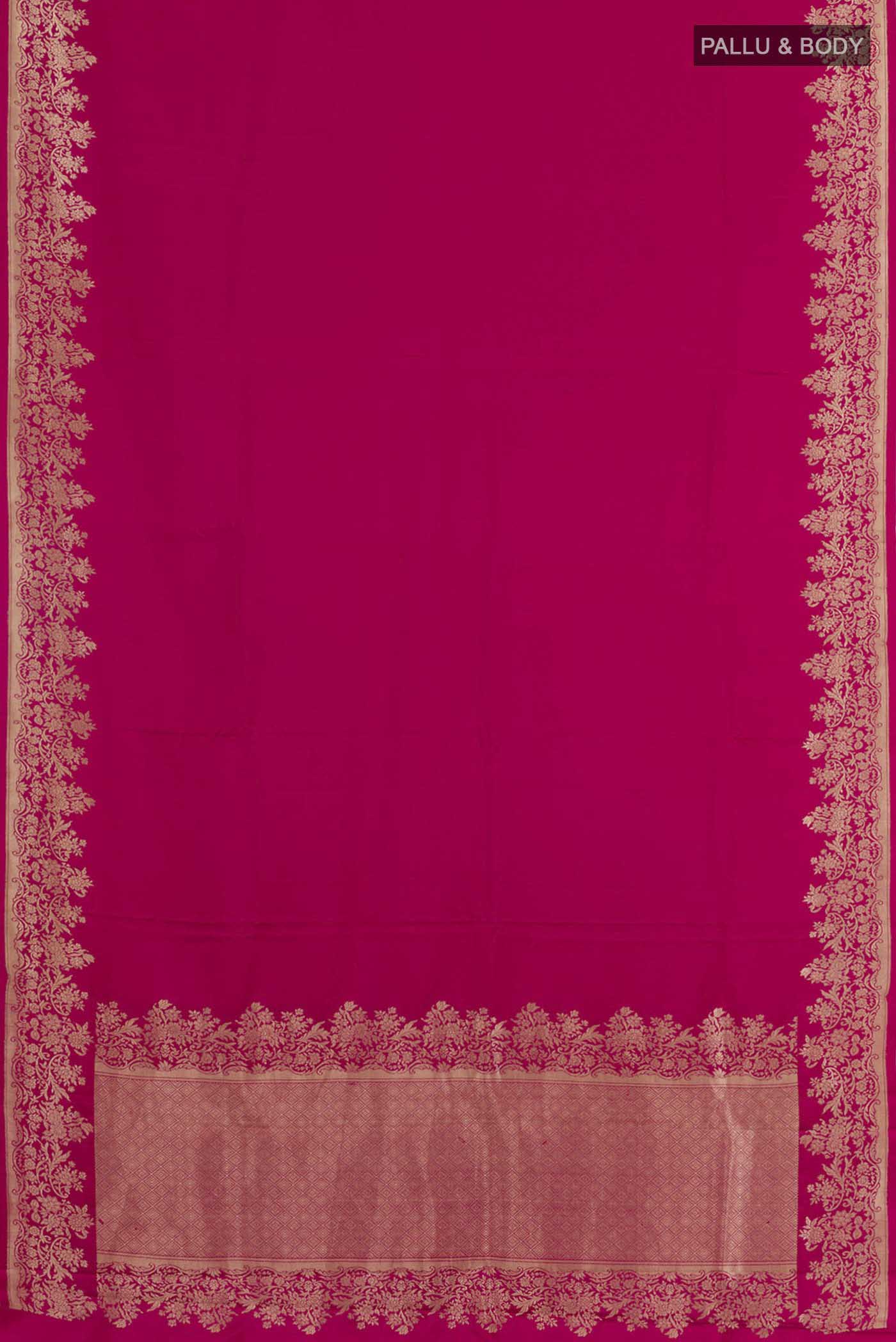 Flat view of Rani Pink Banarasi Silk Saree with Plain Body and Zari Border. 