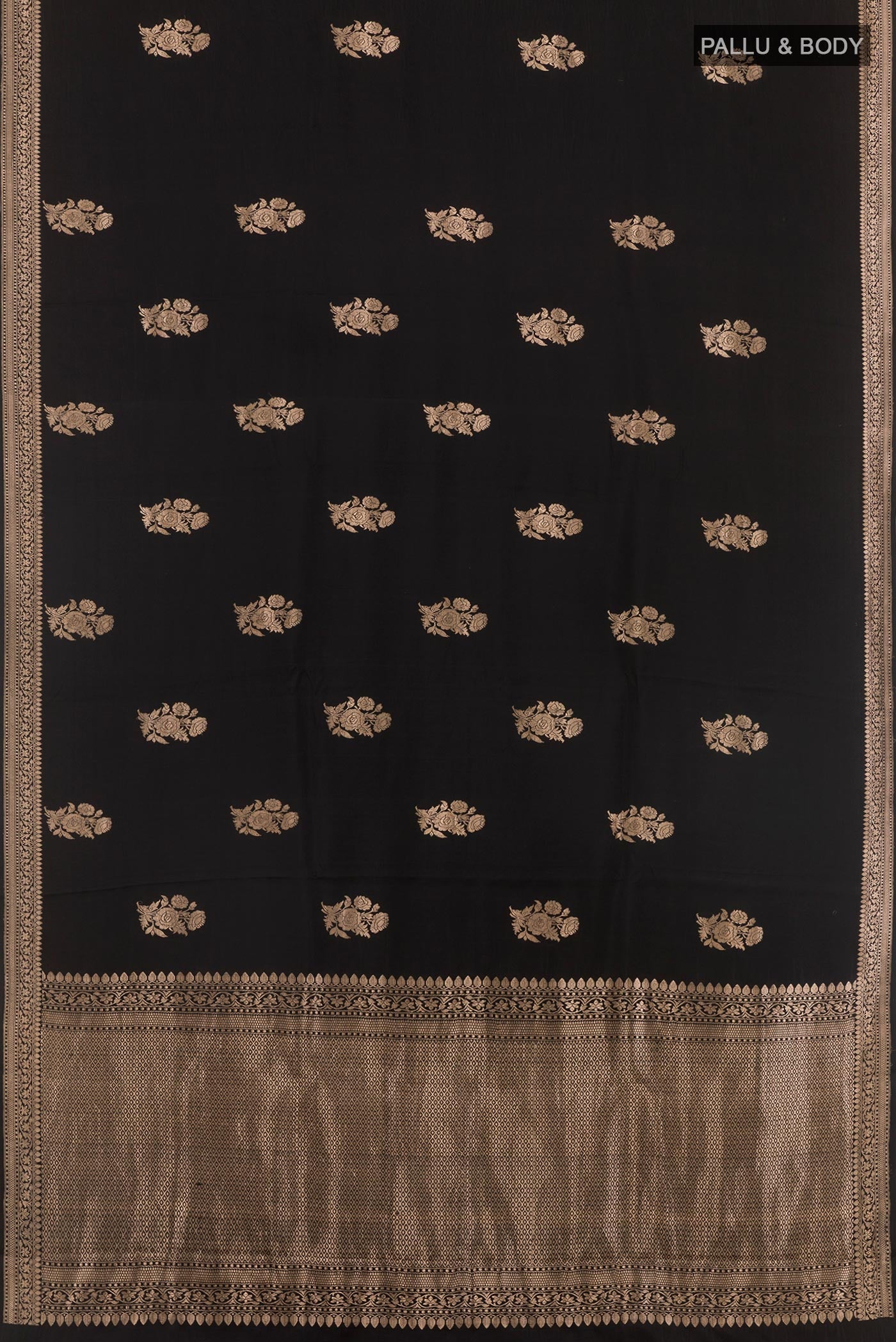 Flat view of Black Banarasi Silk Saree with Zari Butta on the body and Zari Border. 