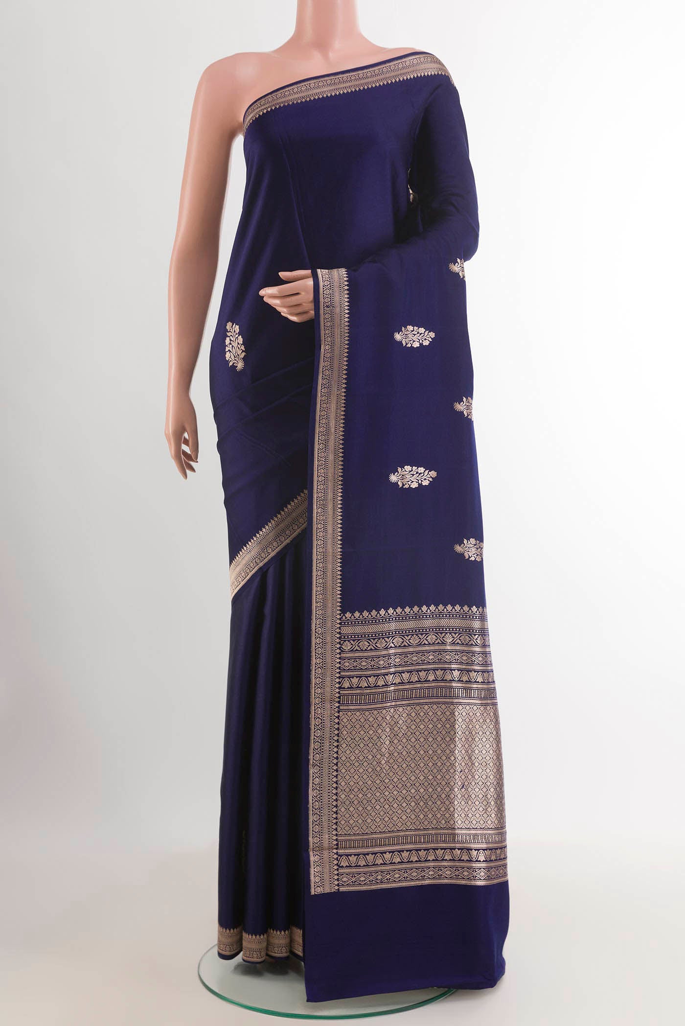 Blue Banarasi Silk Saree with Zari Butta on the body and Zari Border.  displayed on a mannequin