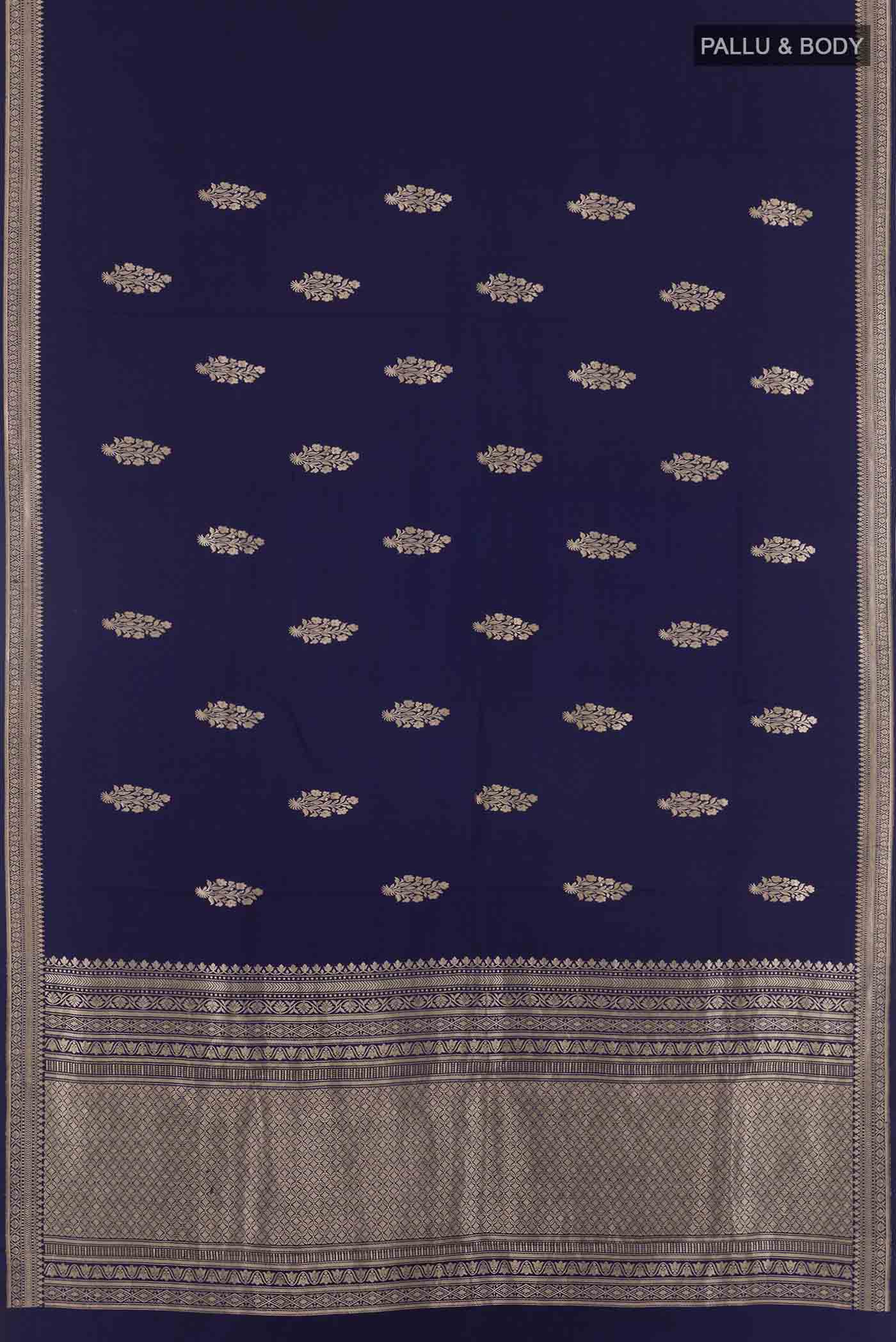 Flat view of Blue Banarasi Silk Saree with Zari Butta on the body and Zari Border. 