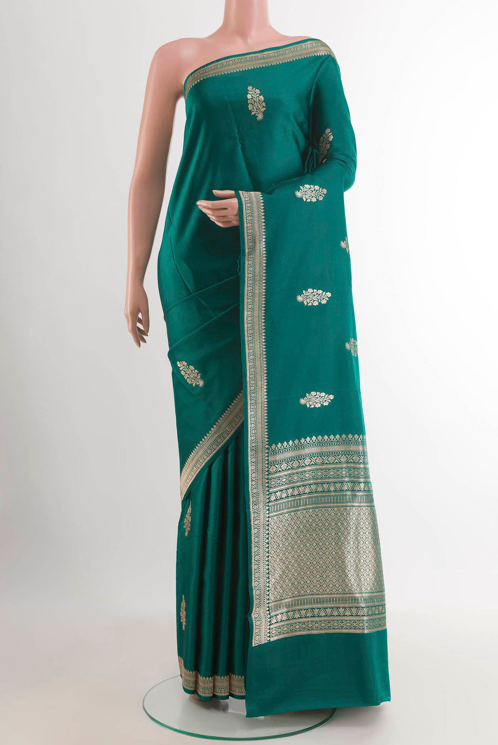 Sea Green Banarasi Silk Saree with Zari Butta on the body and Zari Border.  displayed on a mannequin