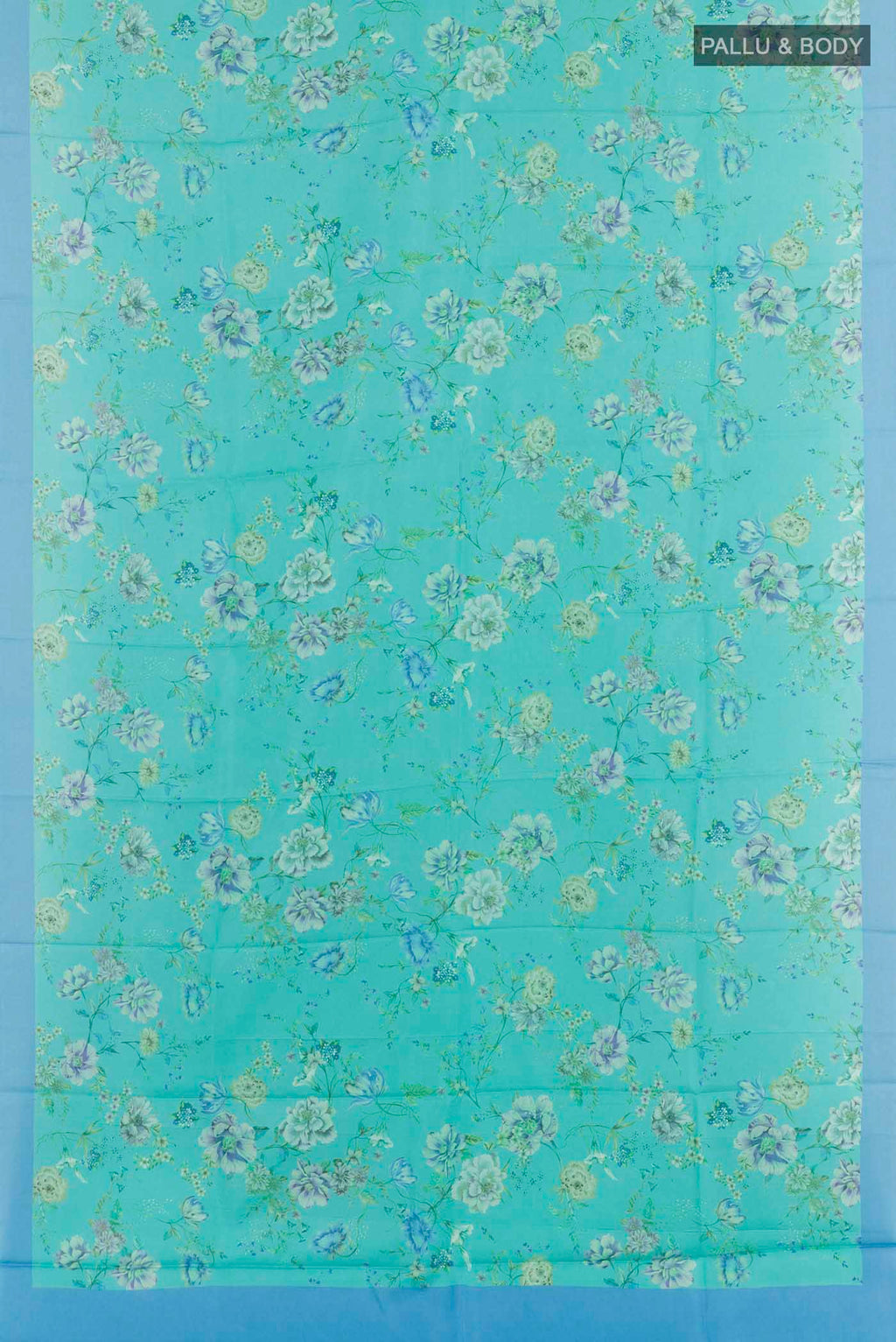 Flat view of Blue Printed Silk Saree with Printed design on the body and Plain Border. 