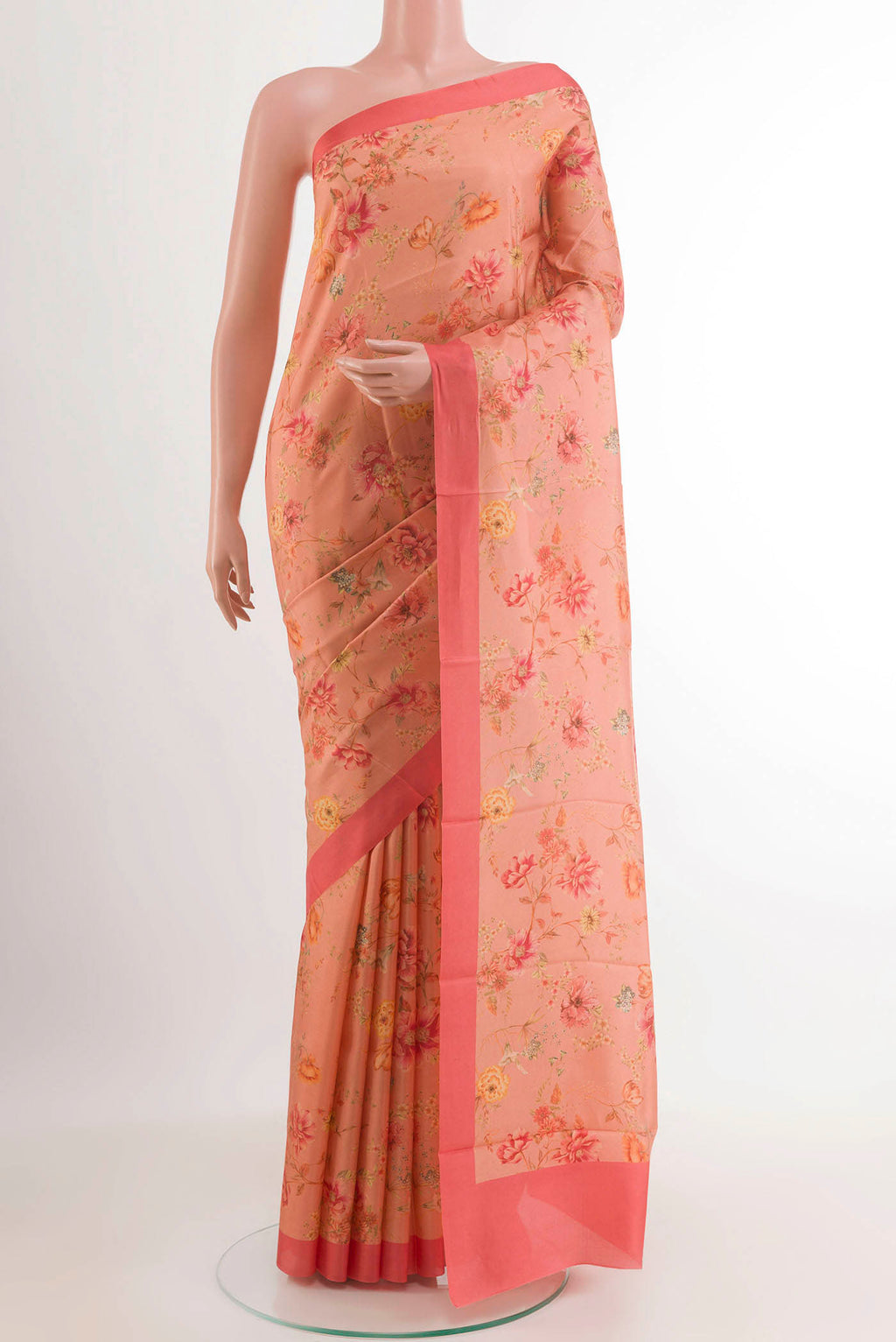 Rose pink Printed Silk Saree with Printed design on the body and Printed Border.  displayed on a mannequin