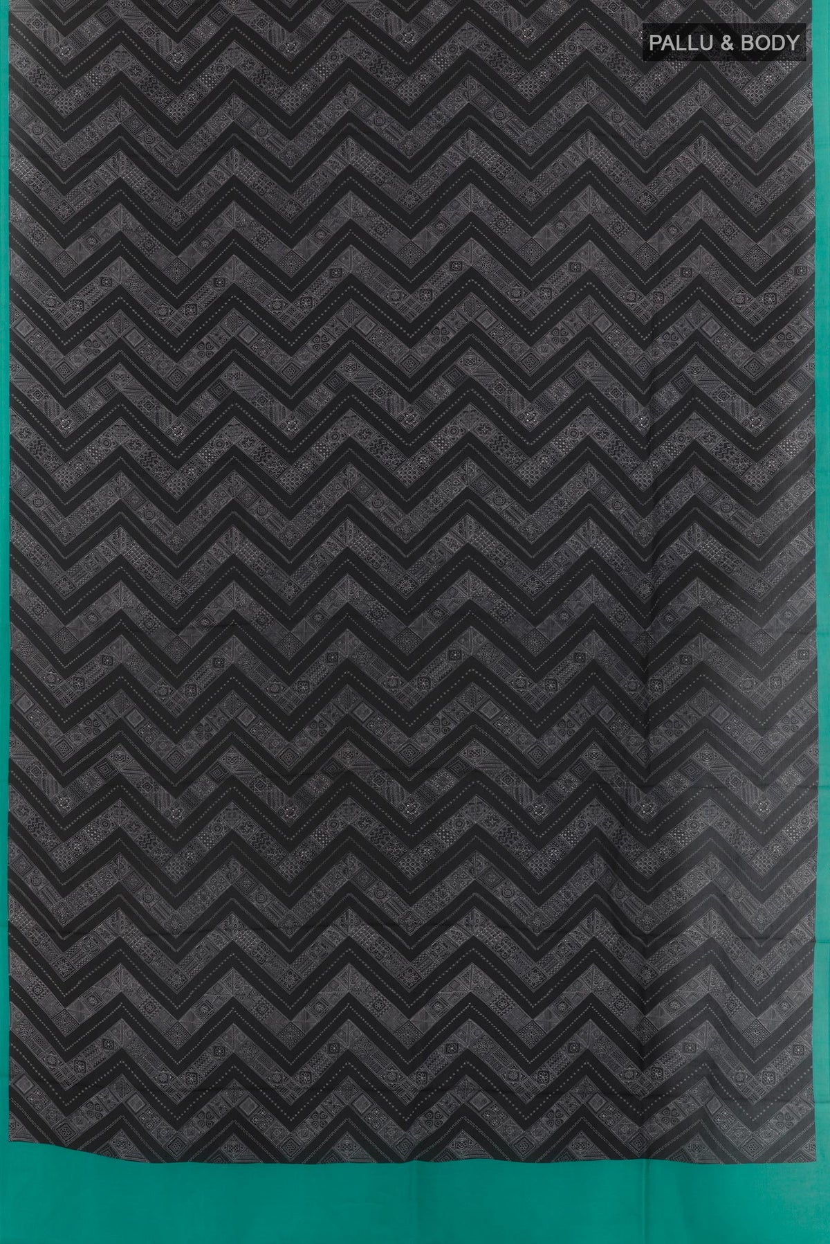 Flat view of Black Printed Silk Saree with Printed design on the body and Printed Border. 