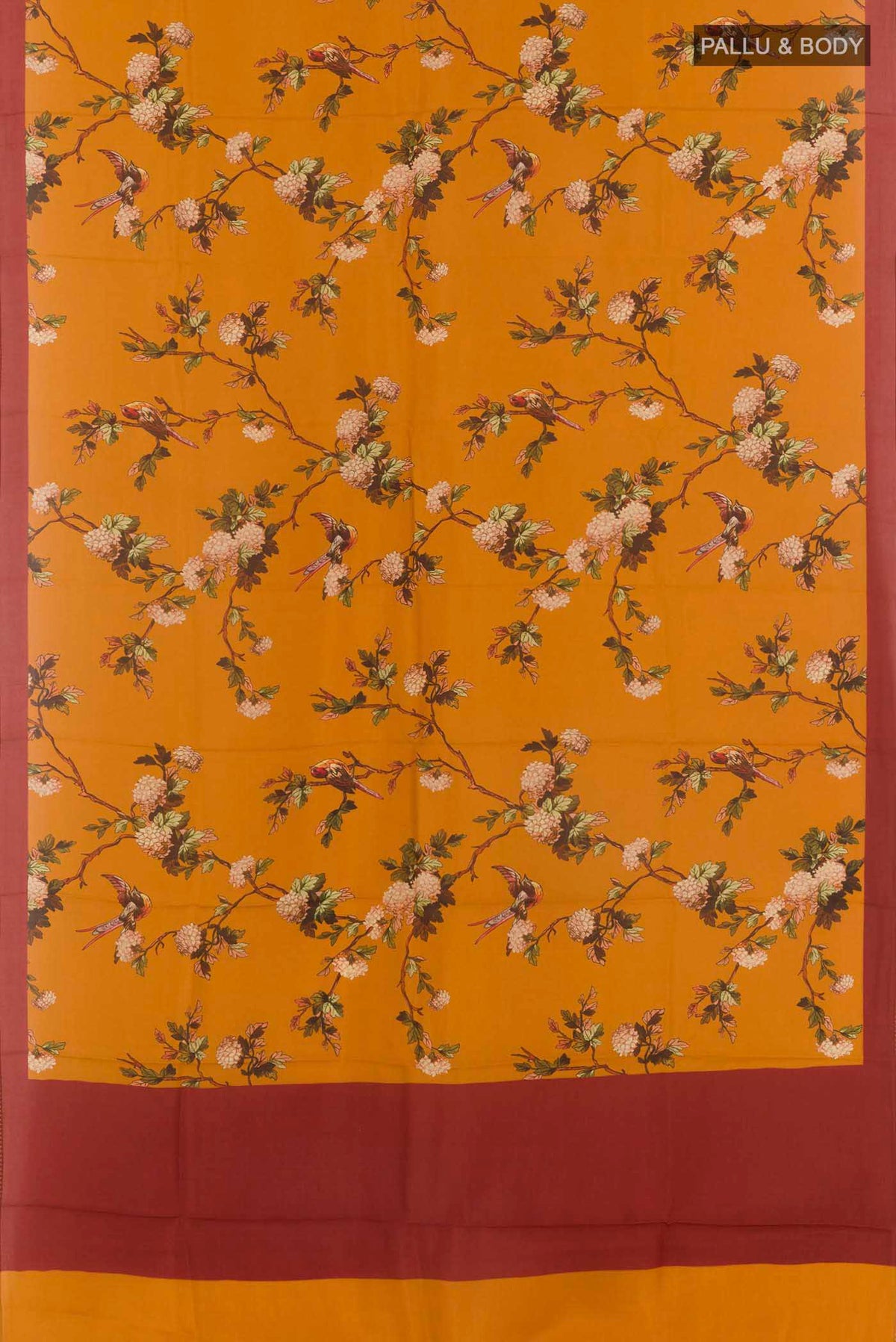 Flat view of Mustard Printed Silk Saree with Printed design on the body and Plain Border. 