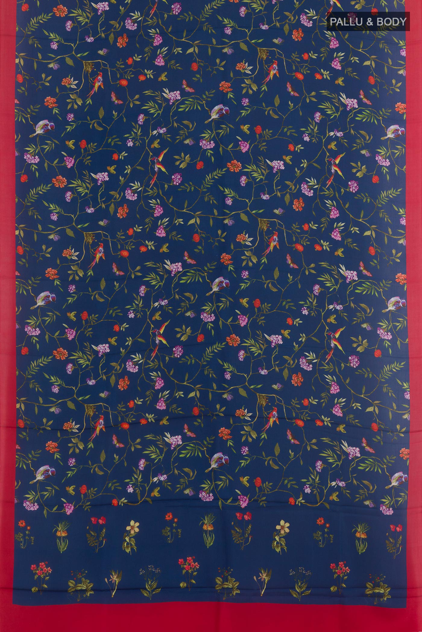 Flat view of Blue Printed Silk Saree with Printed design on the body and Printed Border. 