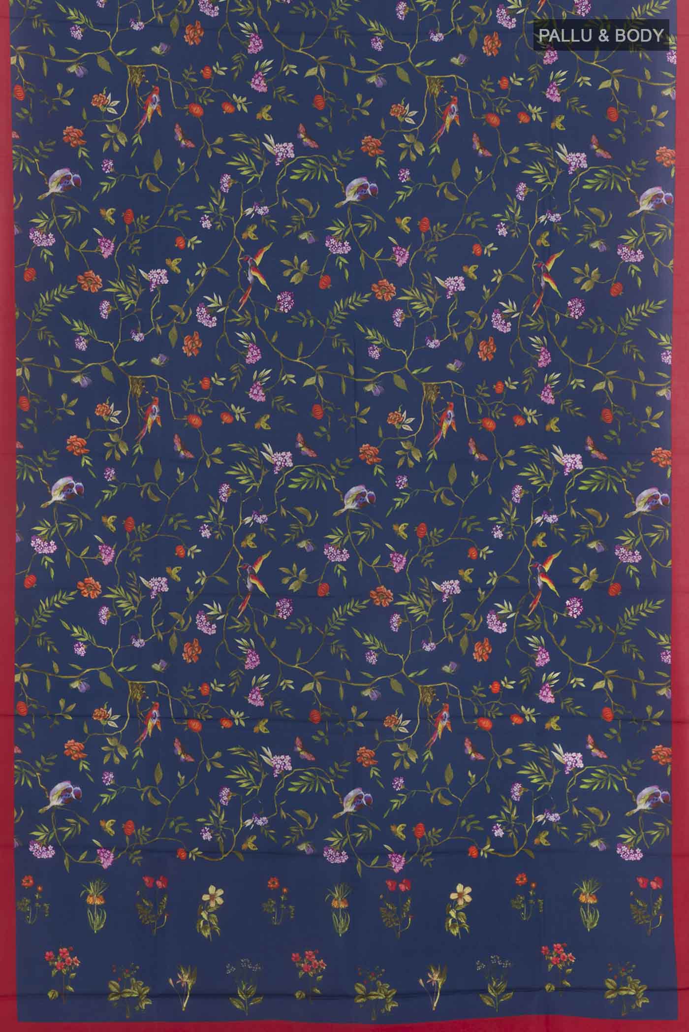 Flat view of Blue Printed Silk Saree with Printed design on the body and Printed Border. 