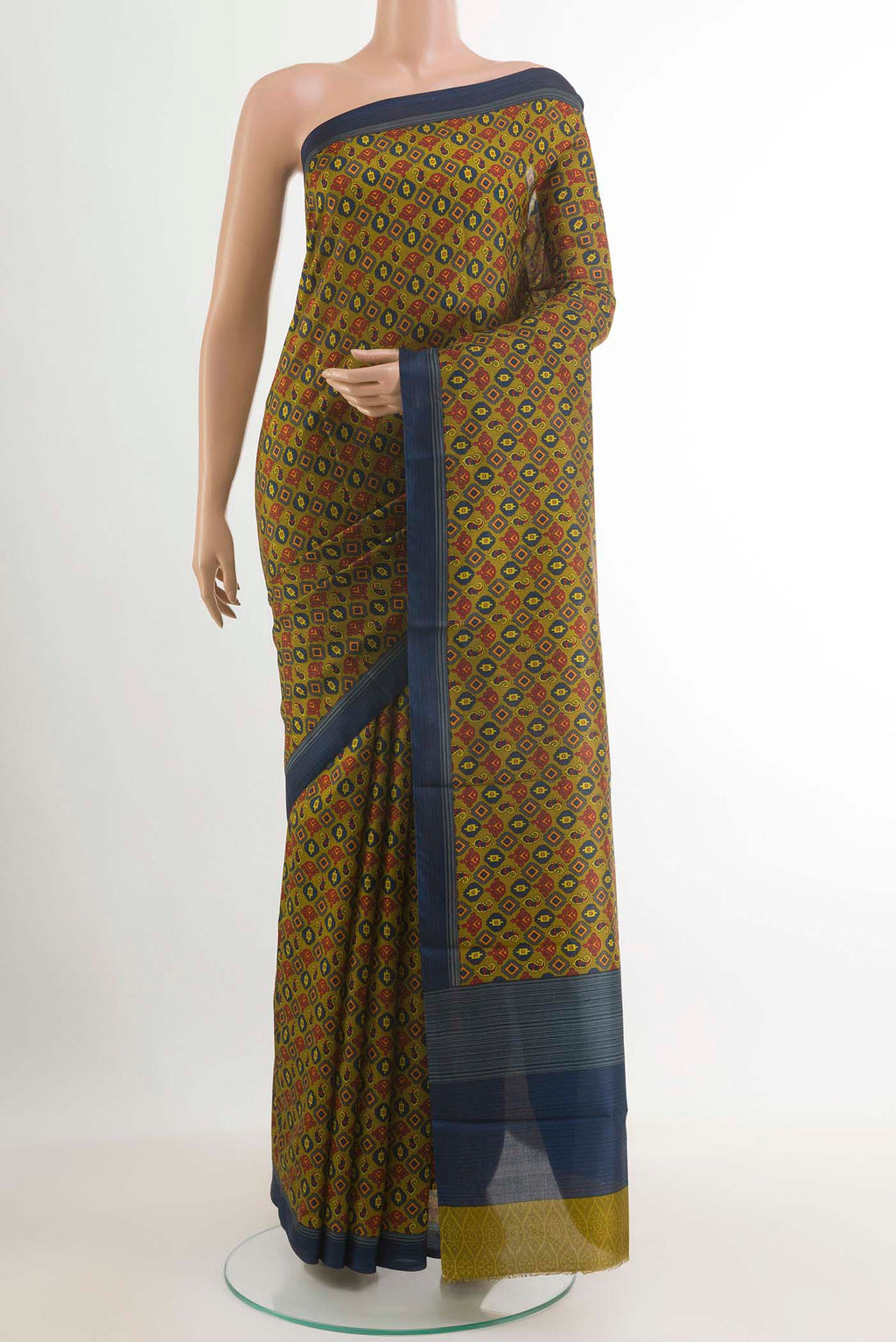 Mehandi Green Printed Silk Saree with Printed design on the body and Printed Border.  displayed on a mannequin