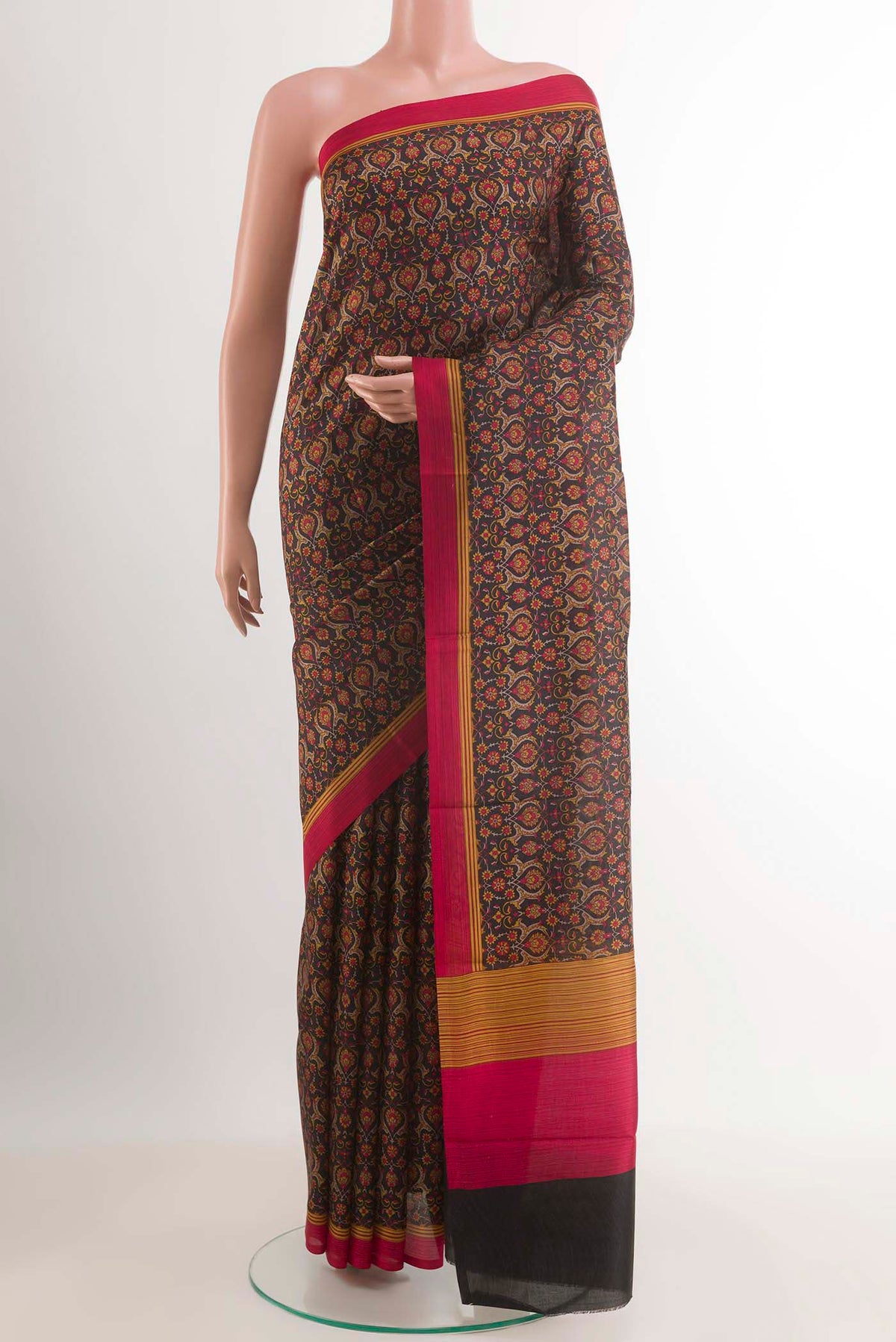 Black Printed Silk Saree with Printed design on the body and Plain Border.  displayed on a mannequin
