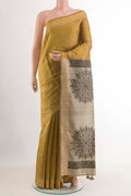 Yellow Tussar Saree with Thread Butta on the body and Thread Border.  displayed on a mannequin