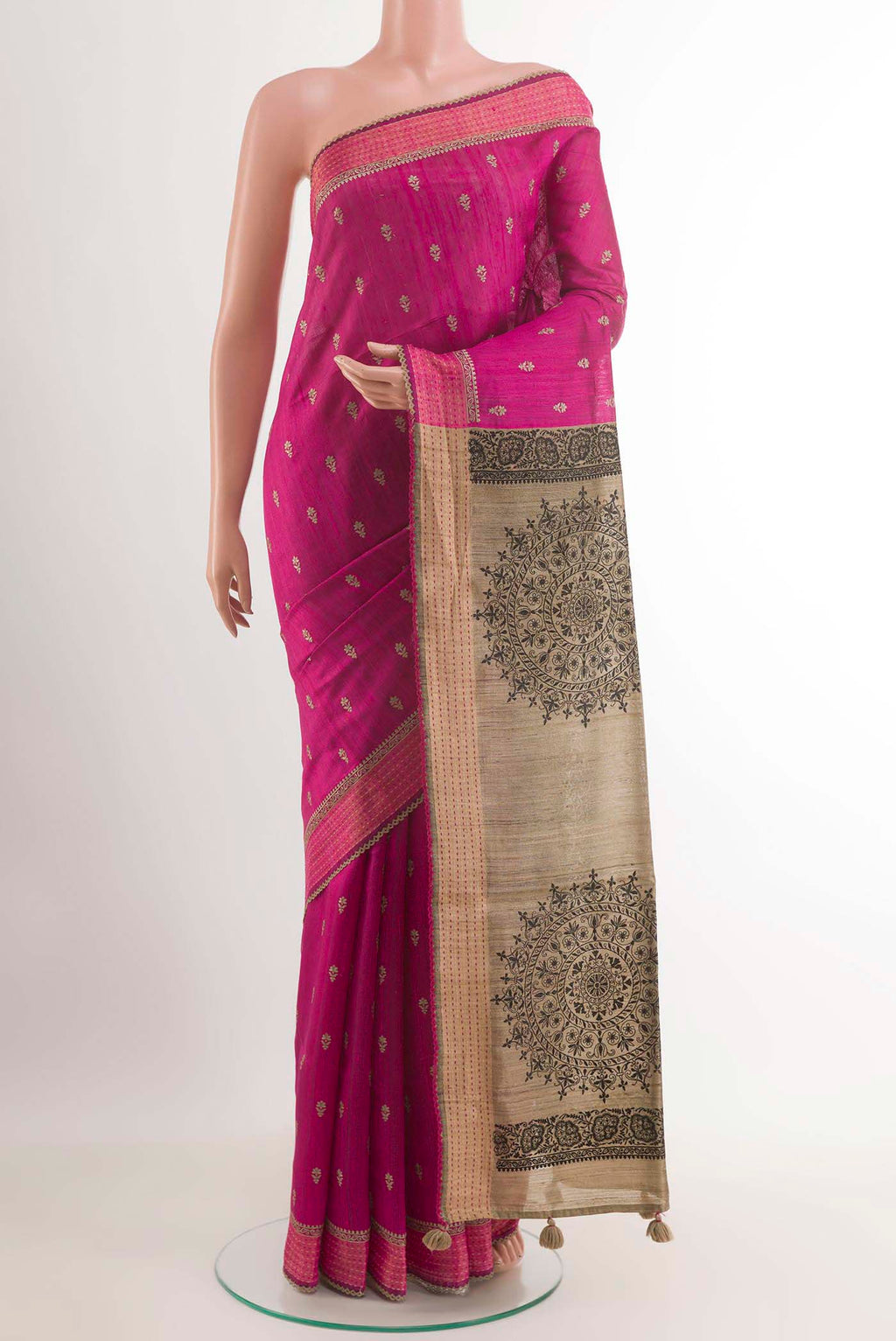 Pink Tussar Saree with Thread Butta on the body and Thread Border.  displayed on a mannequin