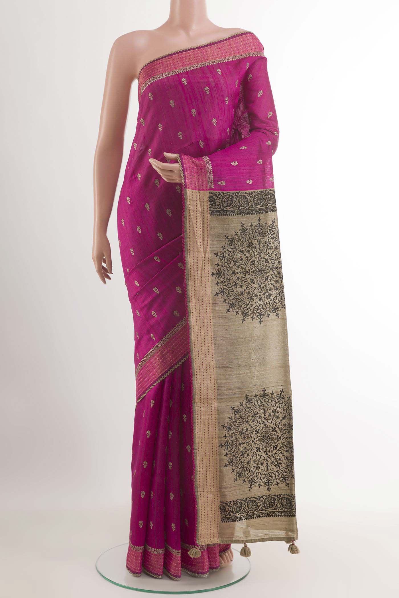 Pink Tussar Saree with Thread Butta on the body and Thread Border.  displayed on a mannequin