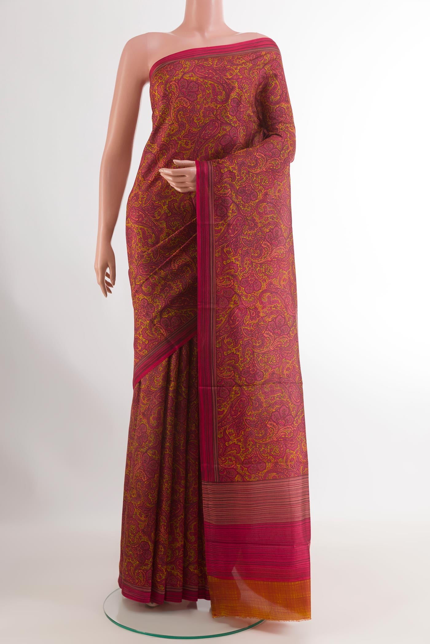 Pink Printed Silk Saree with Printed design on the body and Printed Border.  displayed on a mannequin