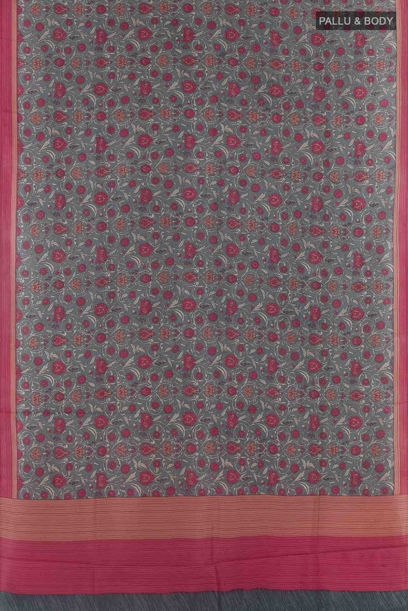 Flat view of Grey Printed Silk Saree with Printed design on the body and Plain Border. 