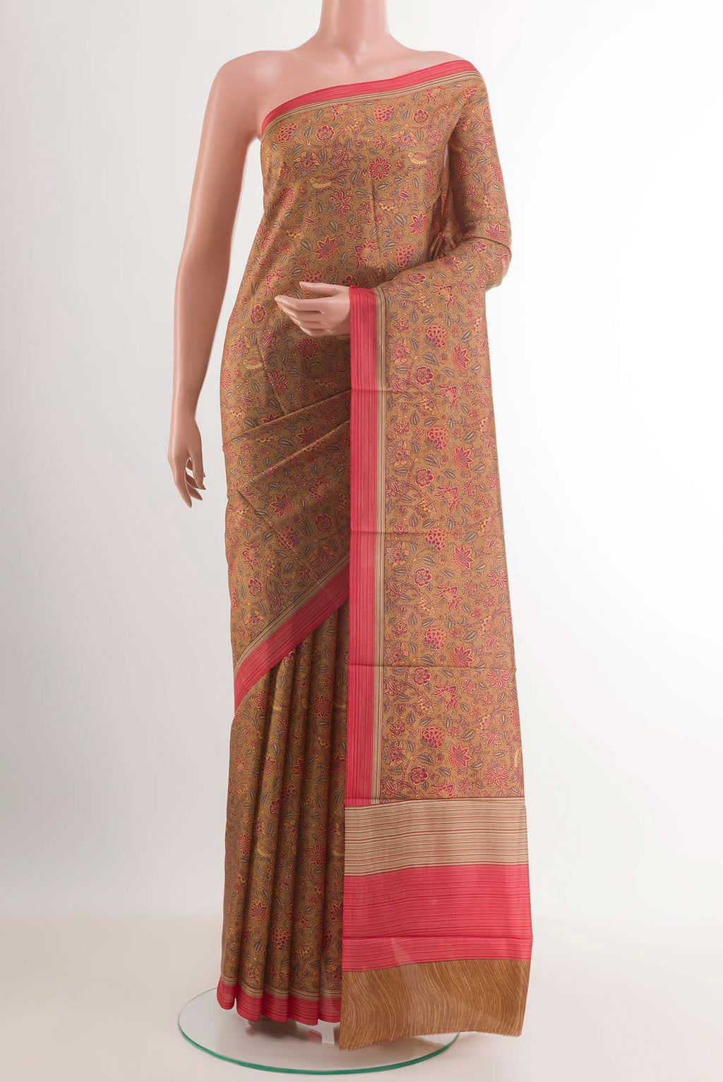 Beige Printed Silk Saree with Printed design on the body and Plain Border.  displayed on a mannequin