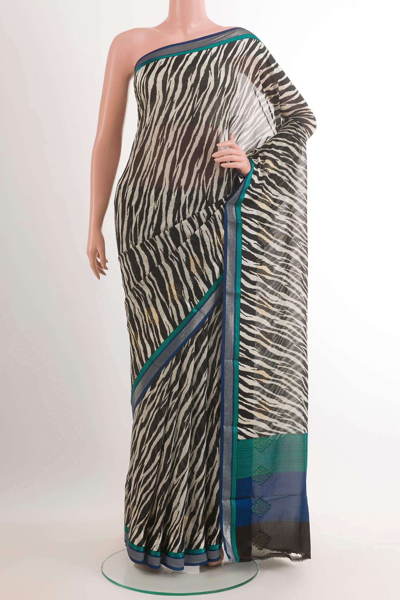 Black Chiffon Saree with Stripes on the body and Zari Border.  displayed on a mannequin
