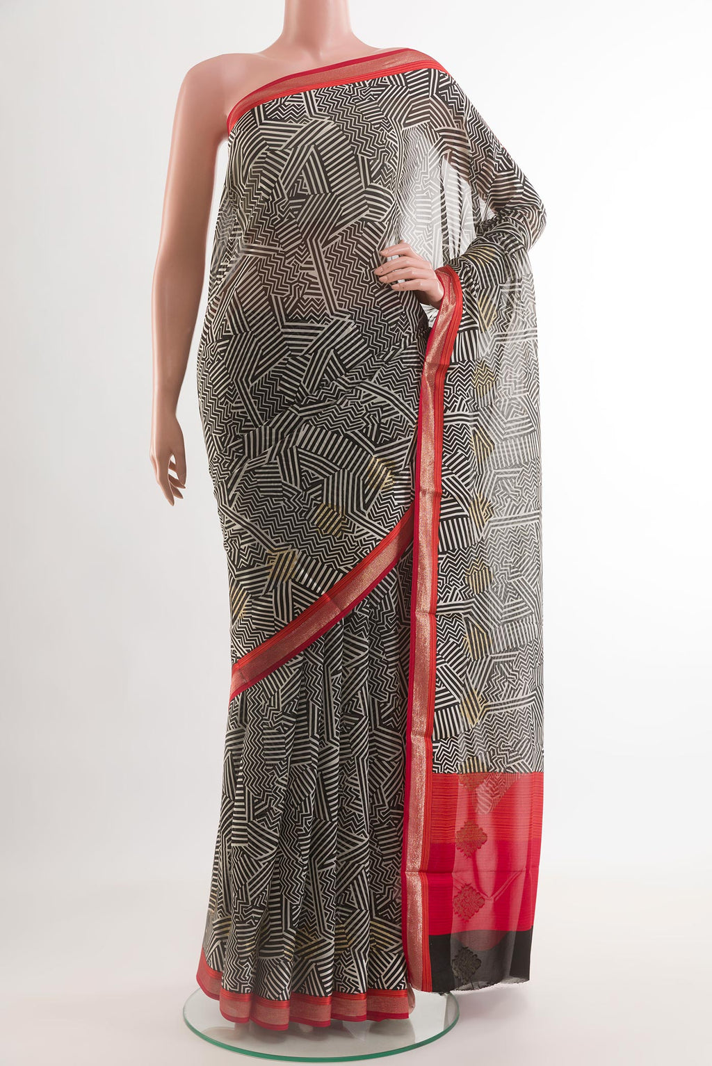 Black Mysore Chiffon Saree with Printed design on the body and Zari Border.  displayed on a mannequin