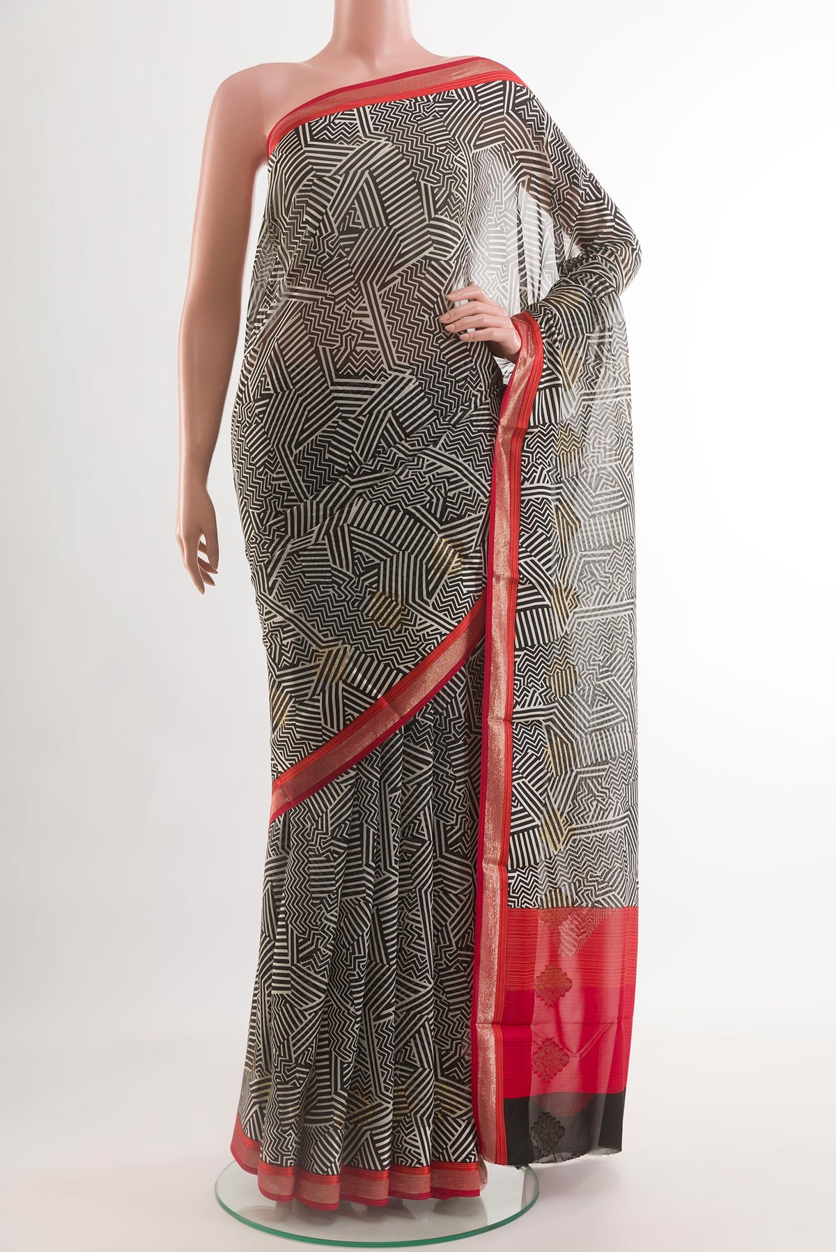 Black Mysore Chiffon Saree with Printed design on the body and Zari Border.  displayed on a mannequin