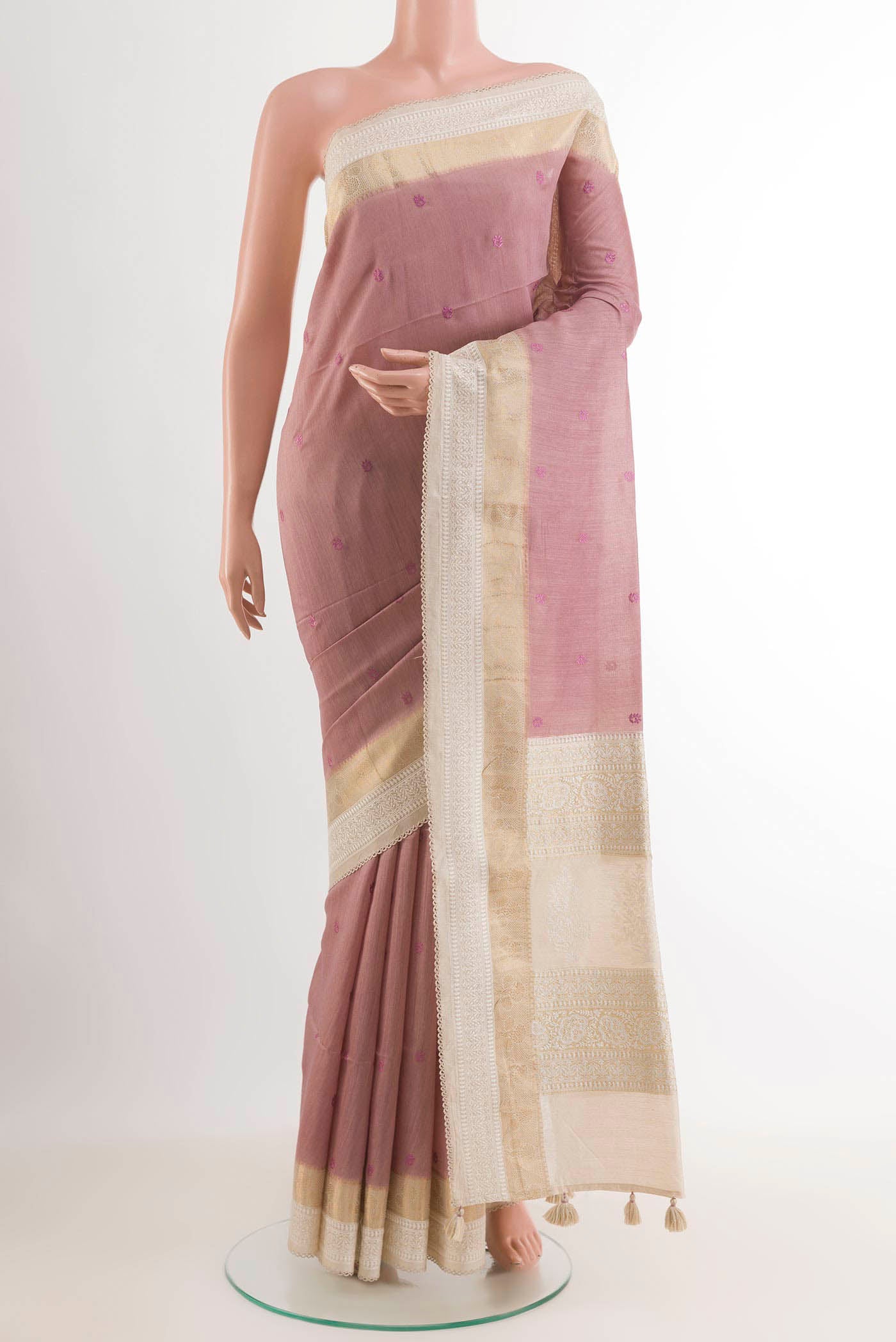Imperial Pink Tussar Saree with Thread Butta on the body and Embroidery Border.  displayed on a mannequin