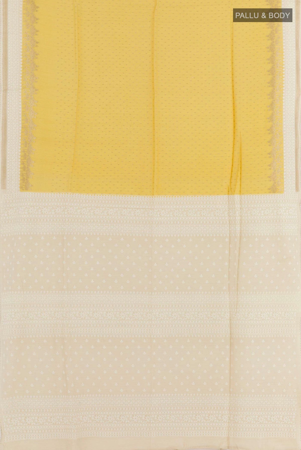 Flat view of Yellow Tussar Saree with Zari Butta on the body and Zari Border. 