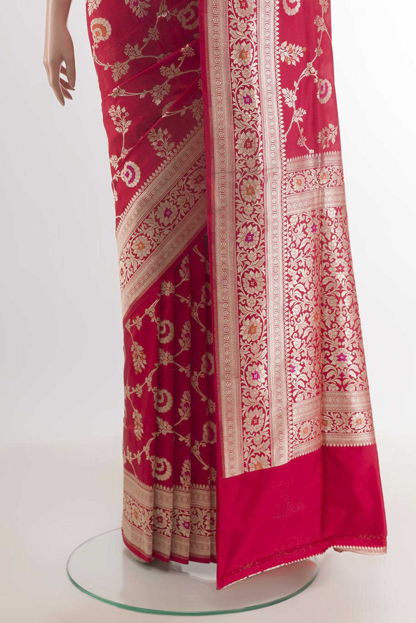 Pleats and pallu of Red Banarasi Silk Saree with Zari Brocade on the body and Zari Border. 