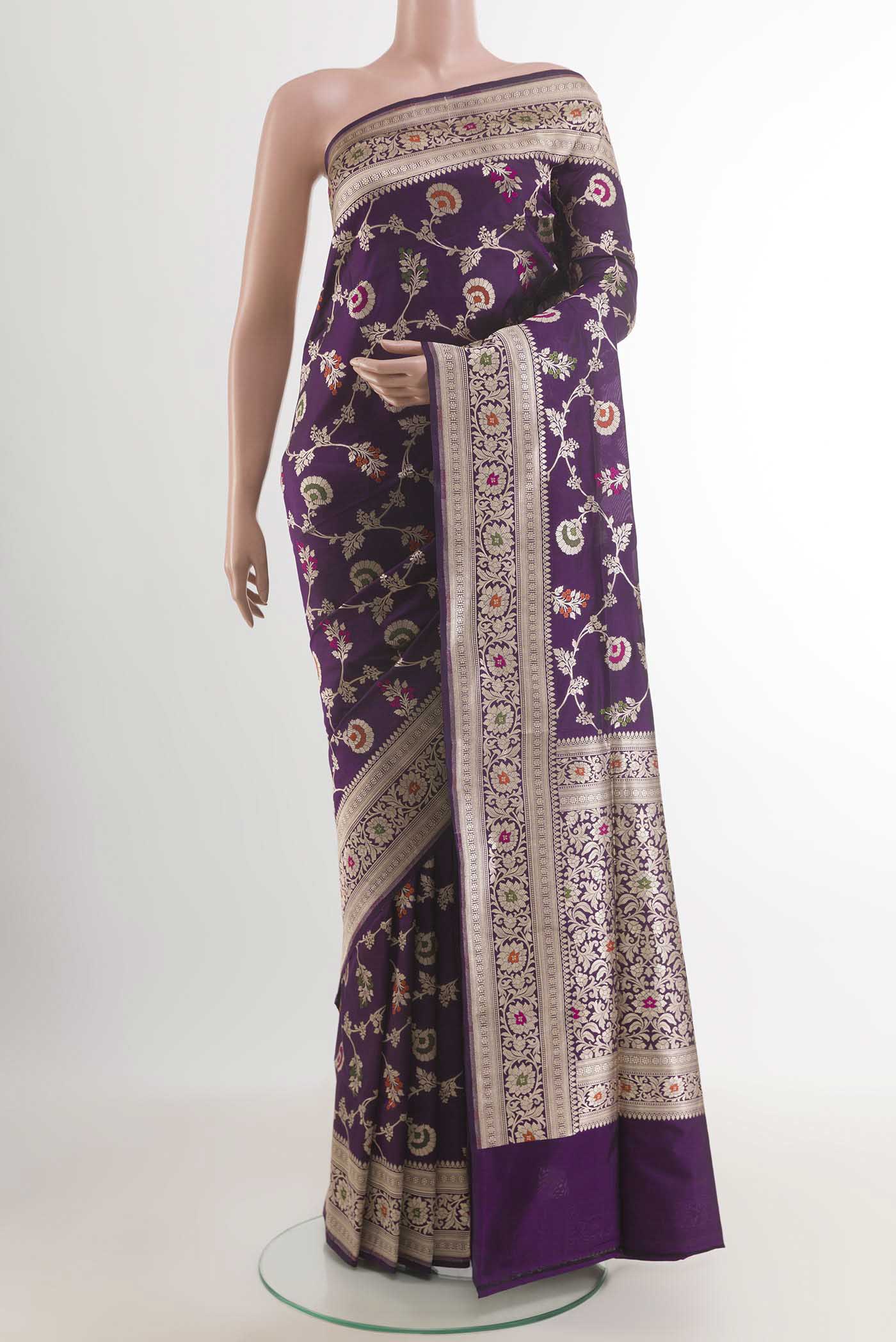 Purple Banarasi Silk Saree with Zari Brocade on the body and Zari Border.  displayed on a mannequin