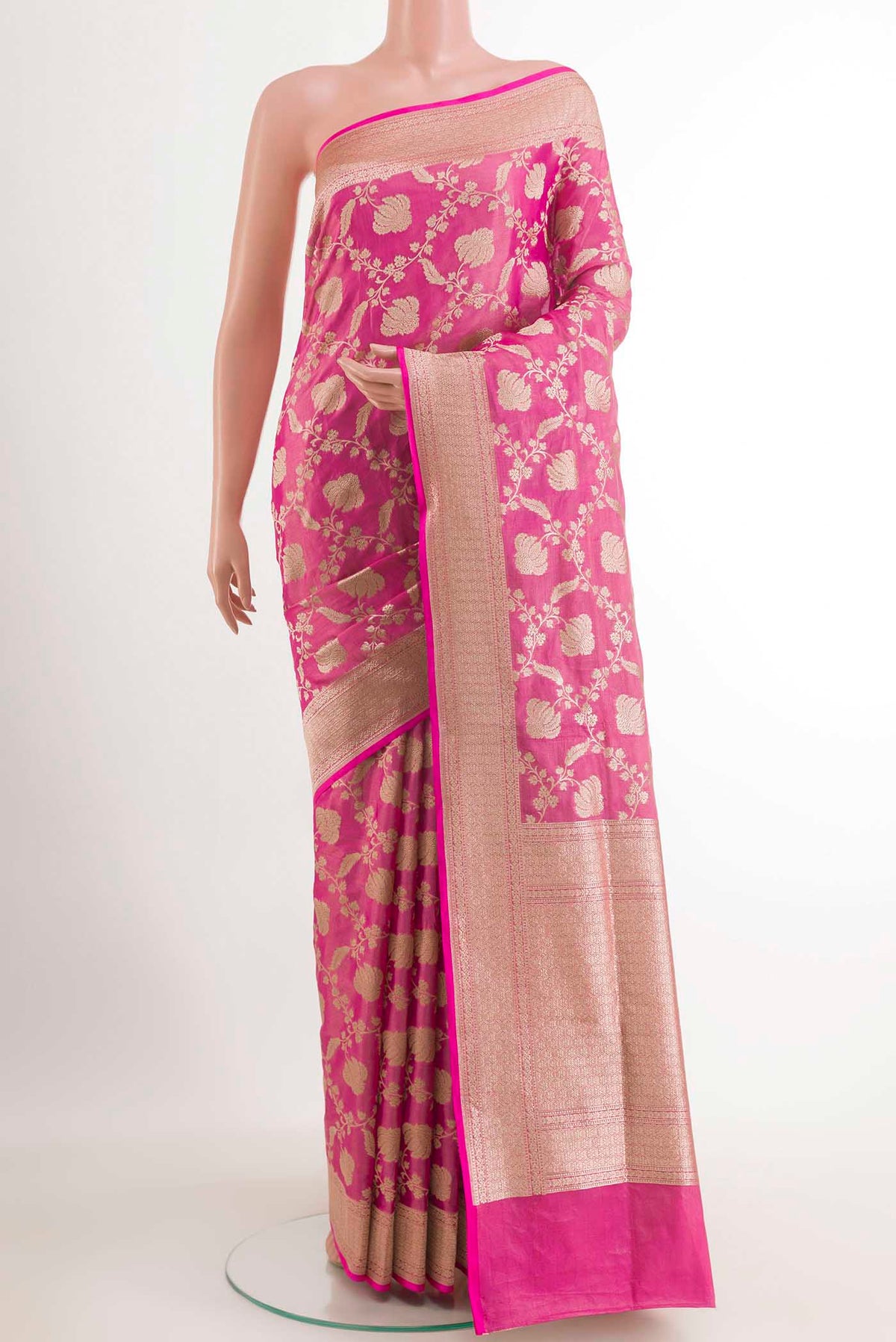 Pink Banarasi Silk Saree with Zari Brocade on the body and Zari Border.  displayed on a mannequin