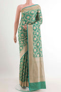 Sea Green Banarasi Silk Saree with Zari Brocade on the body and Zari Border.  displayed on a mannequin