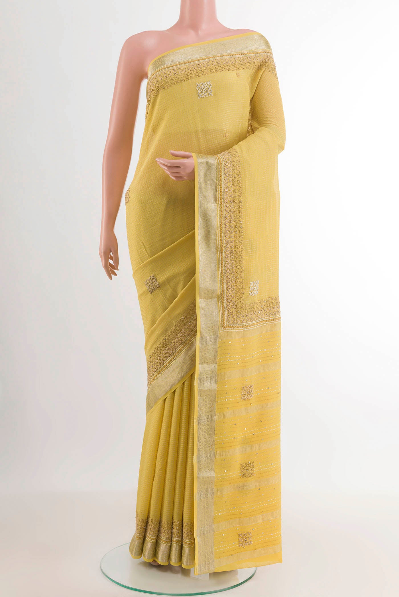 Yellow Mysore Georgette Saree with Checked design on the body and Zari Border.  displayed on a mannequin