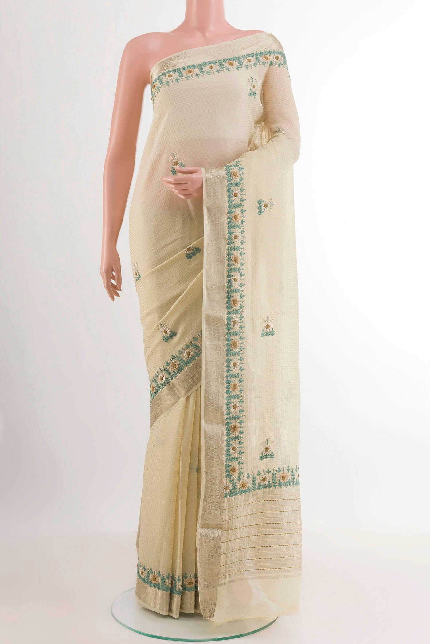 Off White Mysore Crepe Saree with Checked design on the body and Zari Border.  displayed on a mannequin