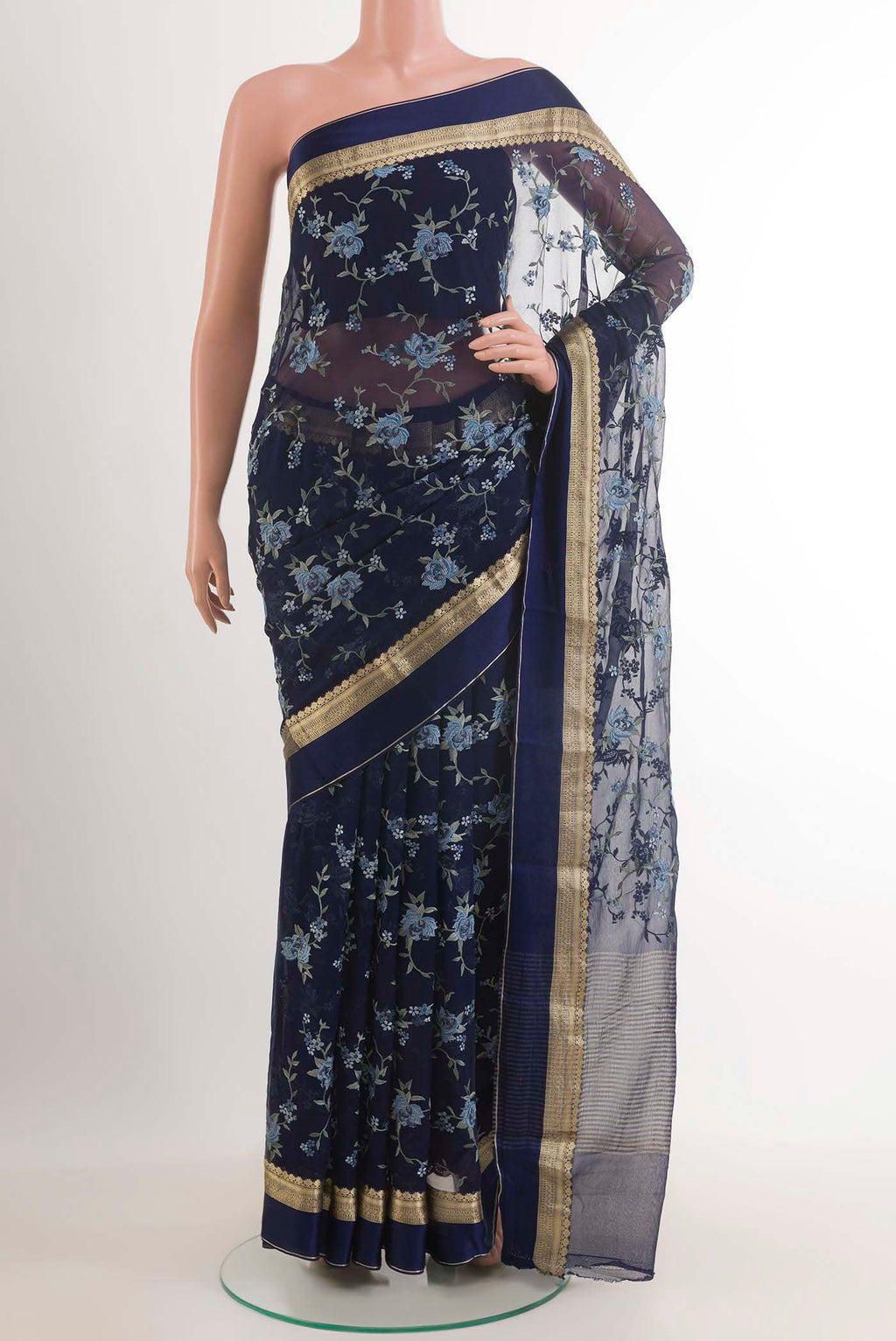 Blue Mysore Chiffon Saree with Embroidery on the body and Zari Border.  displayed on a mannequin