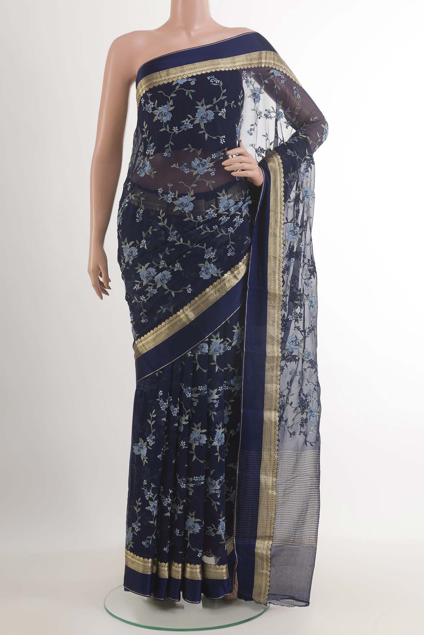 Blue Mysore Chiffon Saree with Embroidery on the body and Zari Border.  displayed on a mannequin