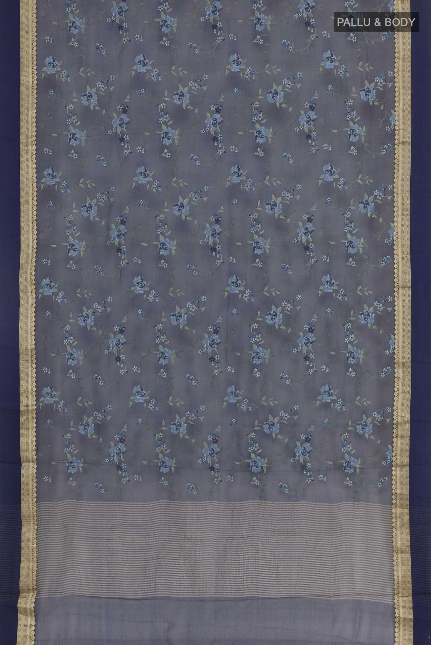 Flat view of Blue Mysore Chiffon Saree with Embroidery on the body and Zari Border. 
