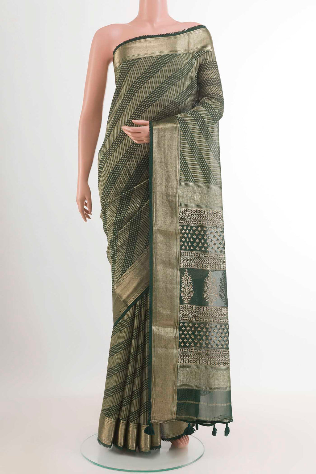 Green Mysore Crepe Saree with Zari Brocade on the body and Zari Border.  displayed on a mannequin
