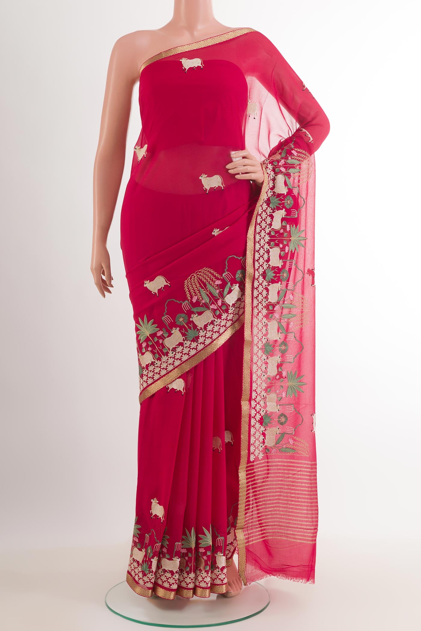 Red Mysore Chiffon Saree with Embroidery on the body and Zari Border.  displayed on a mannequin