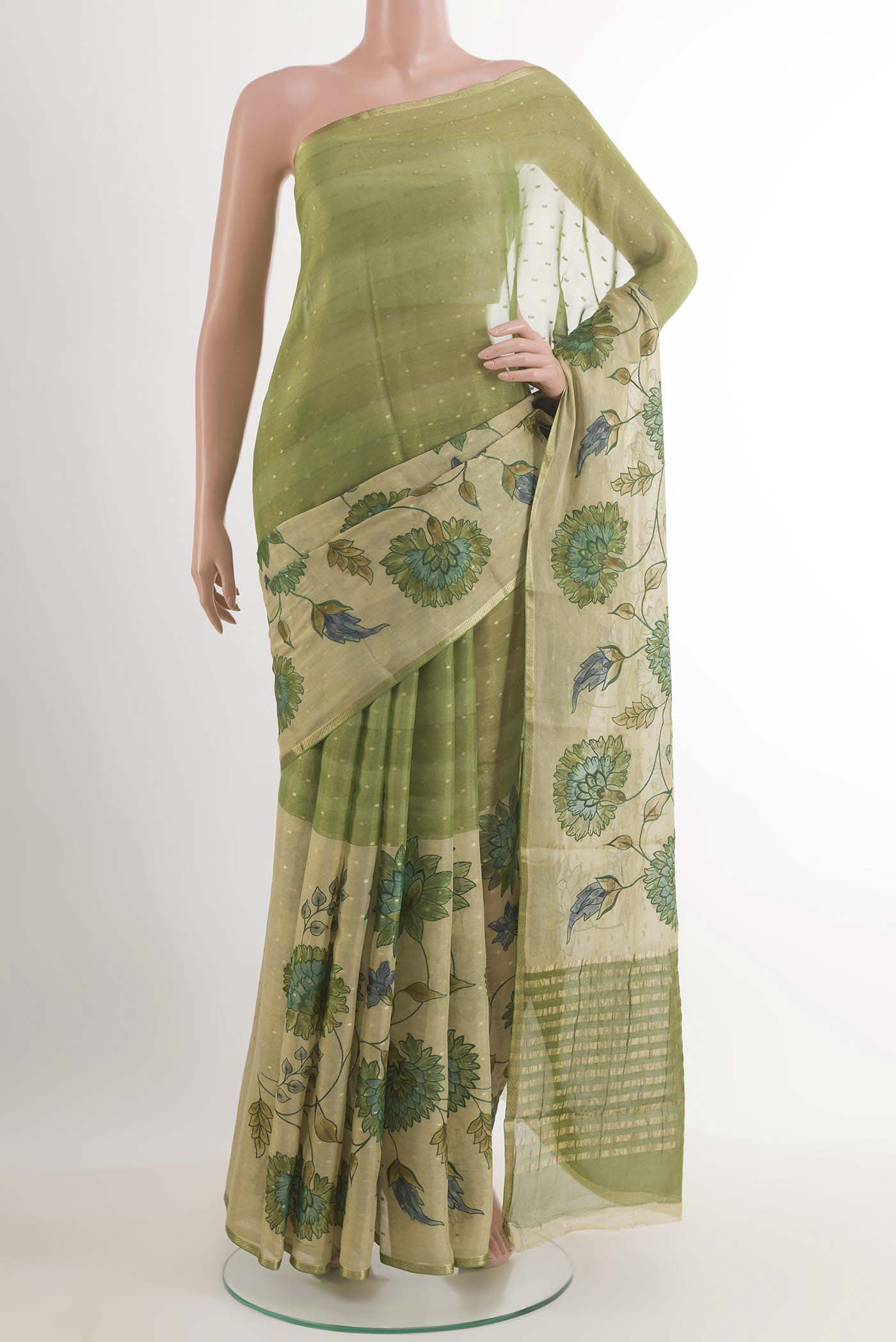 Green Mysore Chiffon Saree with Embroidery on the body and Zari Border.  displayed on a mannequin
