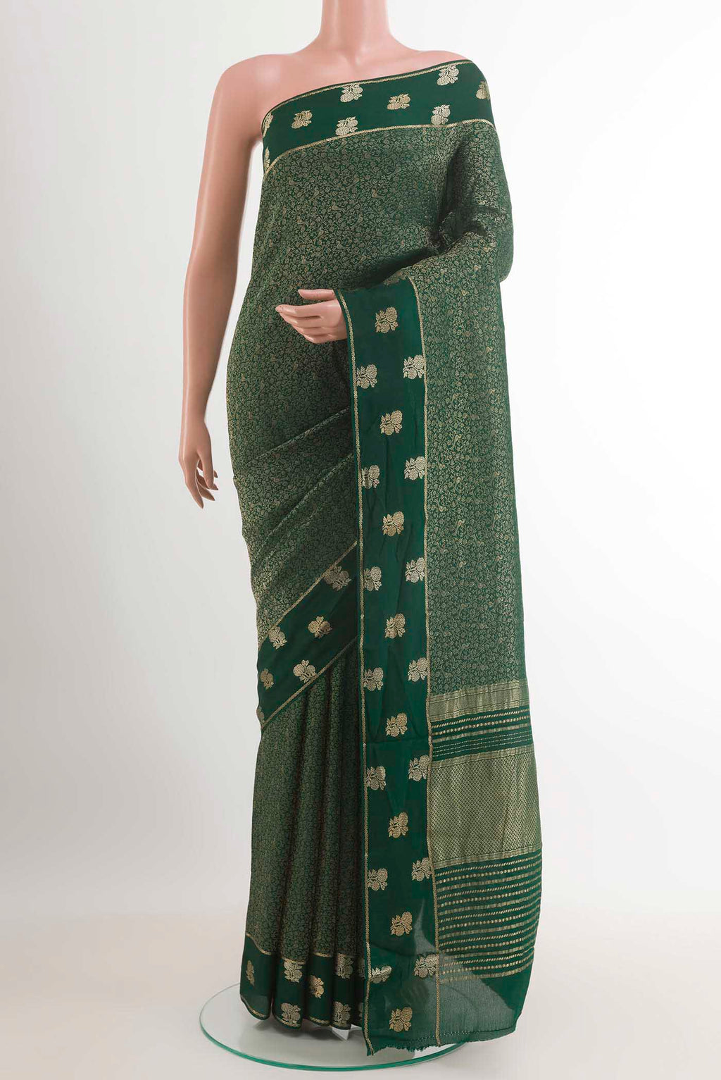 Green Mysore Crepe Saree with Zari Brocade on the body and Zari Border.  displayed on a mannequin