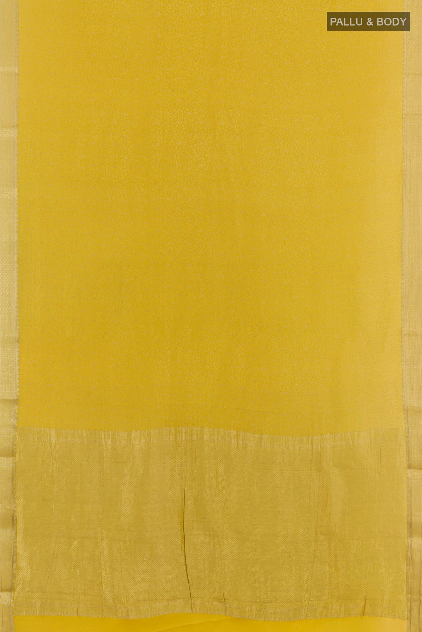 Flat view of Yellow Mysore Crepe Saree with Zari Brocade on the body and Zari Border. 