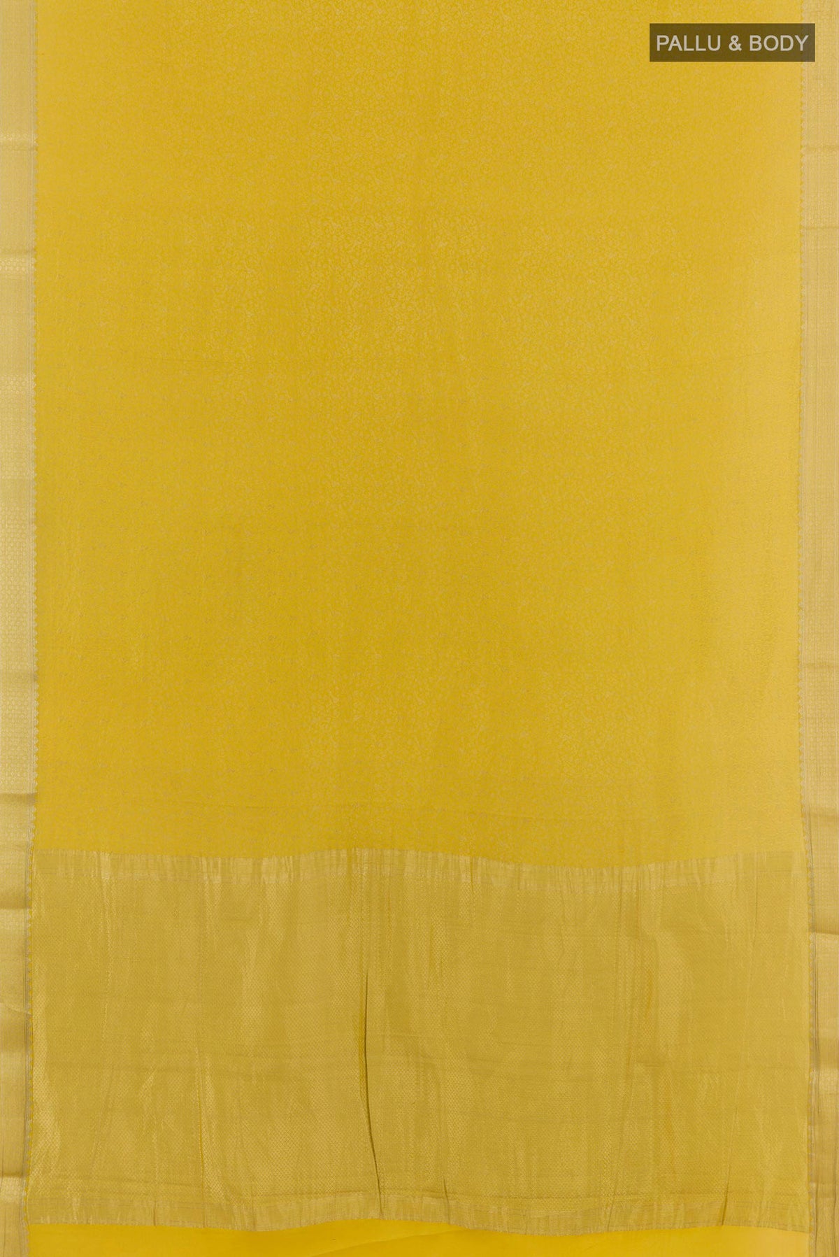 Flat view of Yellow Mysore Crepe Saree with Zari Brocade on the body and Zari Border. 