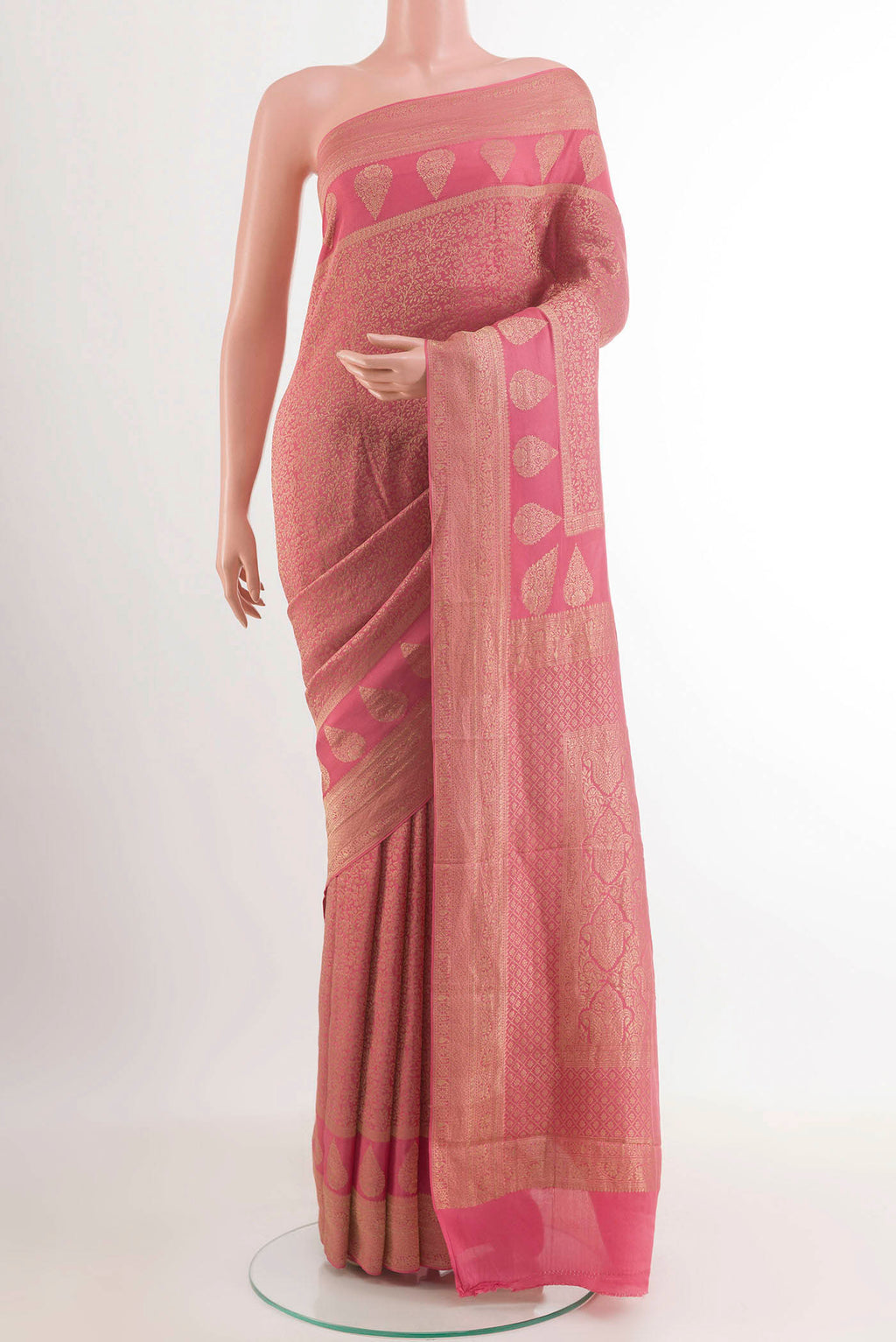 Pink Mysore Crepe Saree with Zari Brocade on the body and Zari Border.  displayed on a mannequin