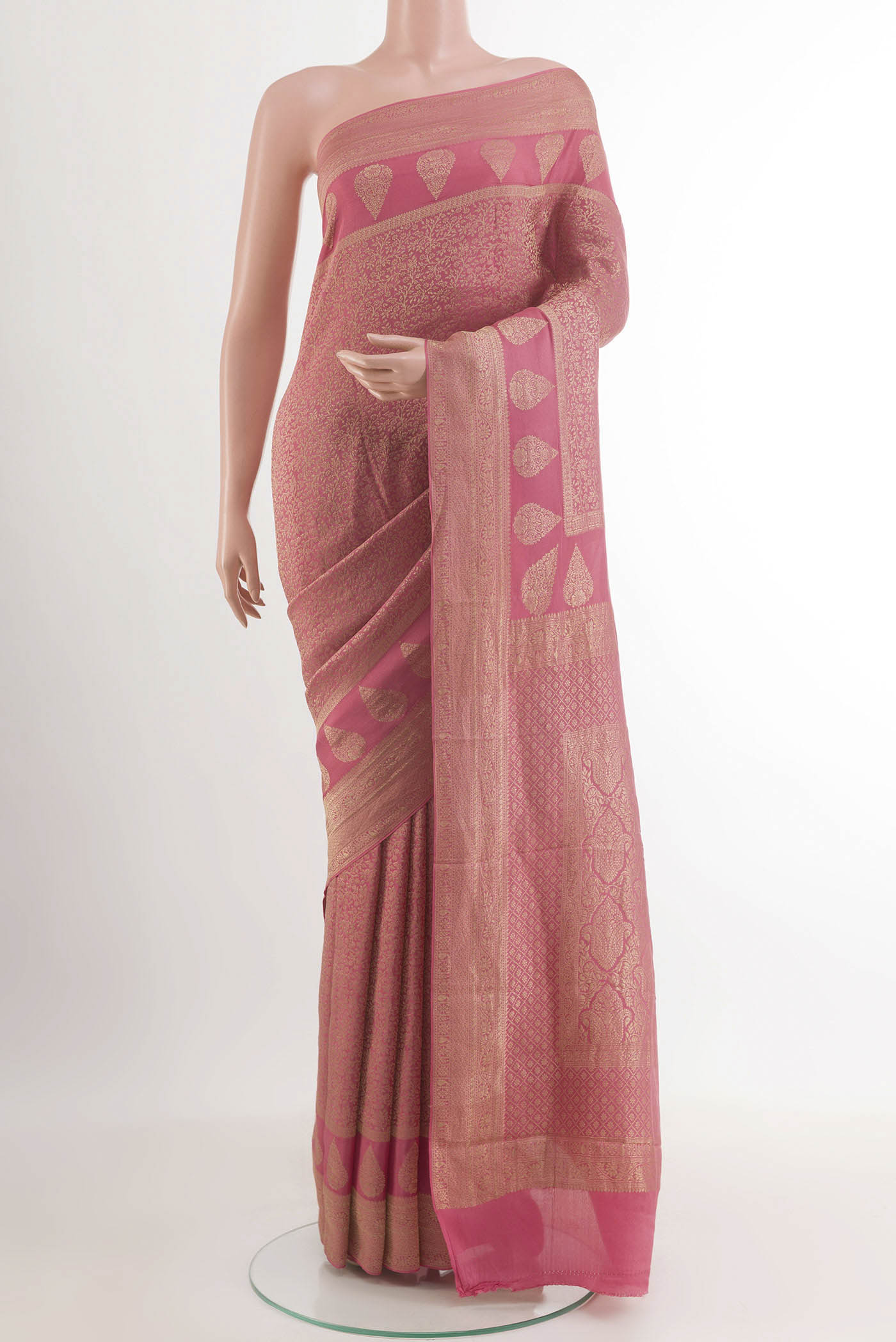 Pink Mysore Crepe Saree with Zari Brocade on the body and Zari Border.  displayed on a mannequin